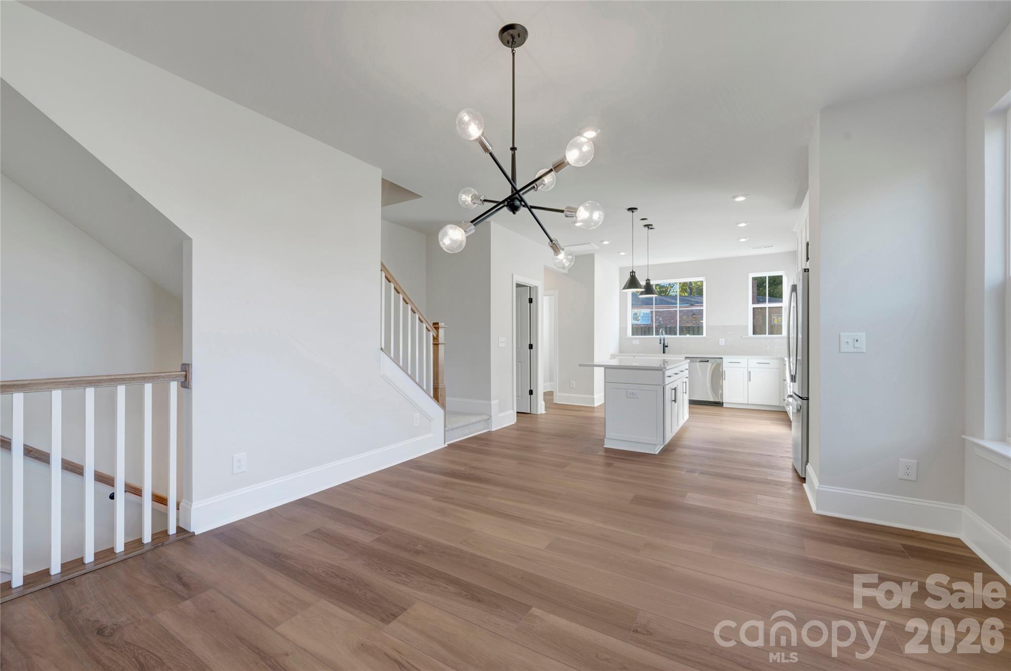 Dining space with chandelier - 240 Old Town Village Road, Waxhaw