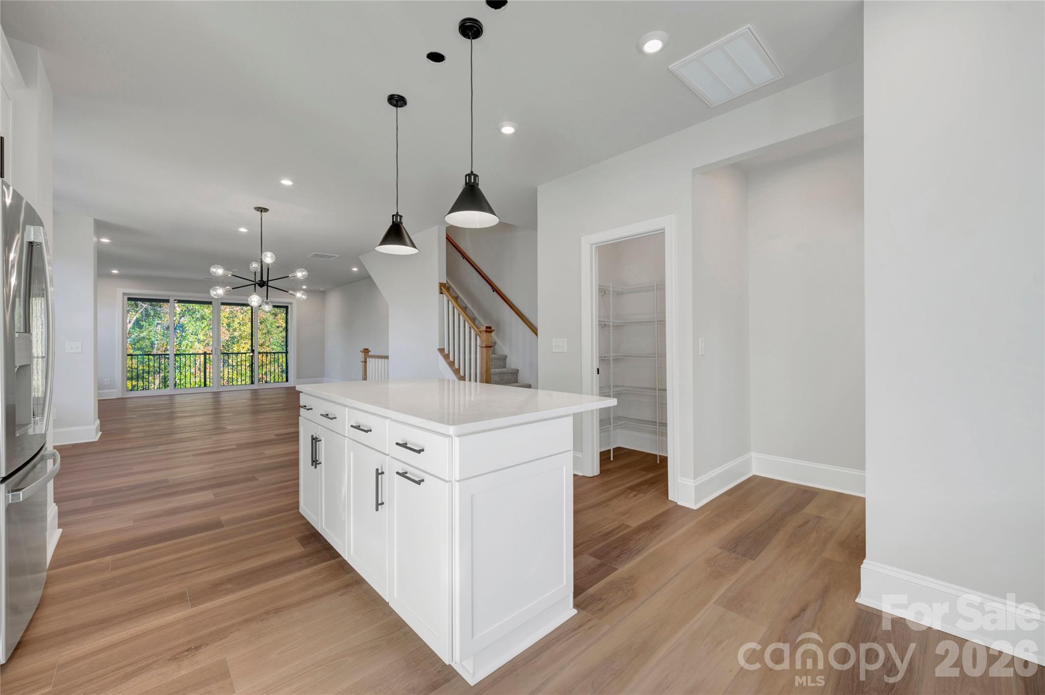 Ample storage in the gourmet kitchen with a walk-in pantry - 240 Old Town Village Road, Waxhaw