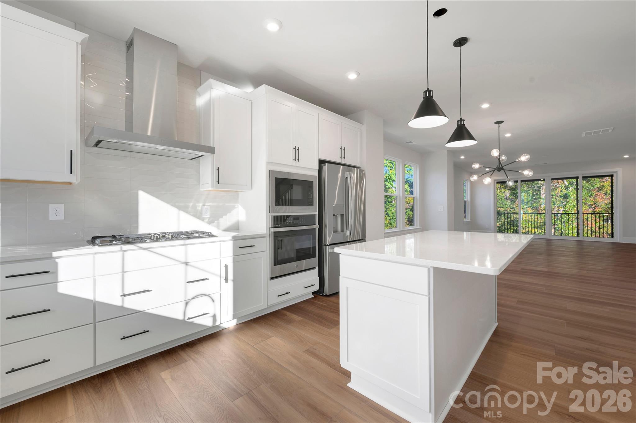 Gas cook top with stainless steel hood - 240 Old Town Village Road, Waxhaw