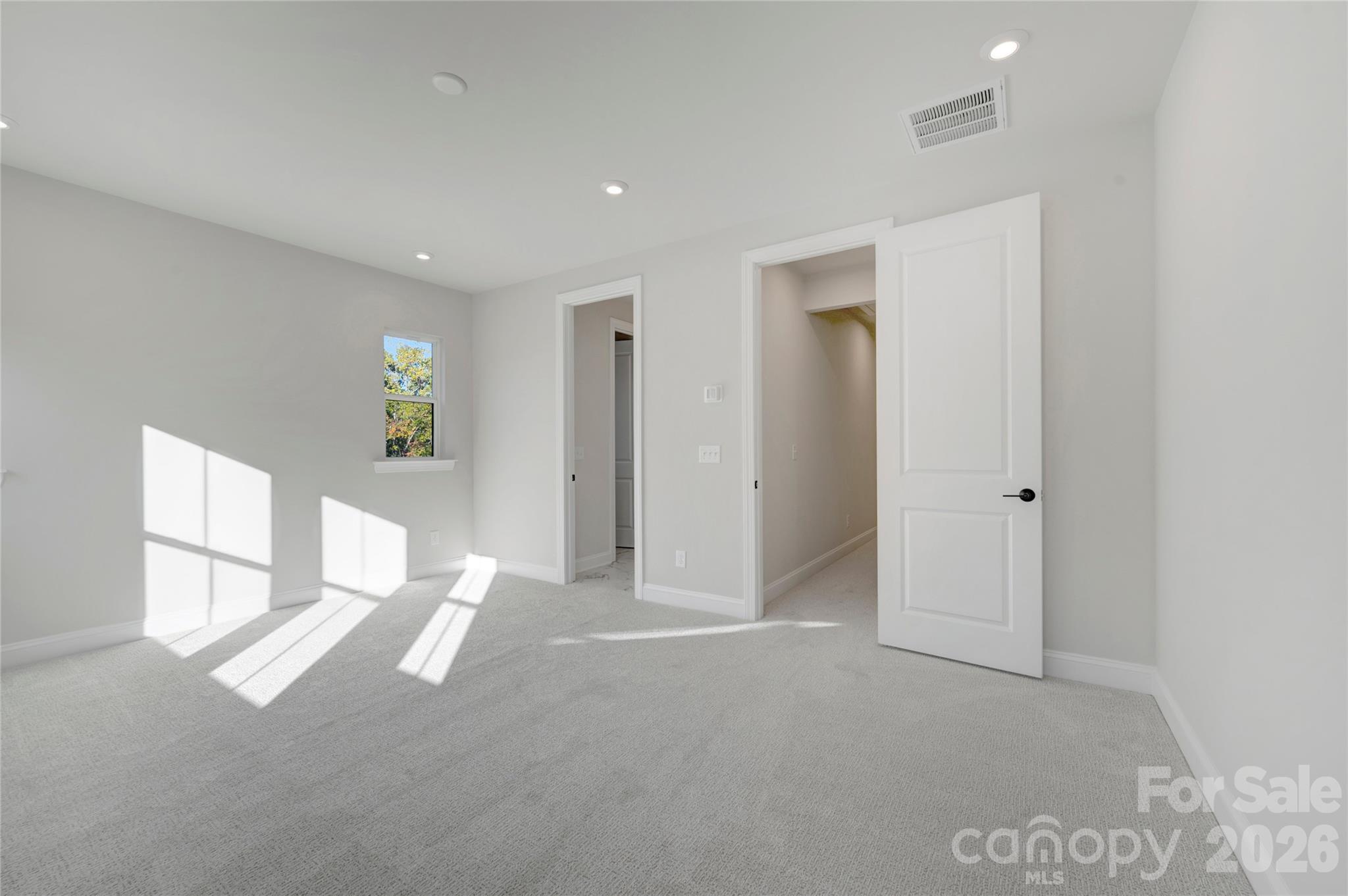 Light filled primary bedroom - 240 Old Town Village Road, Waxhaw