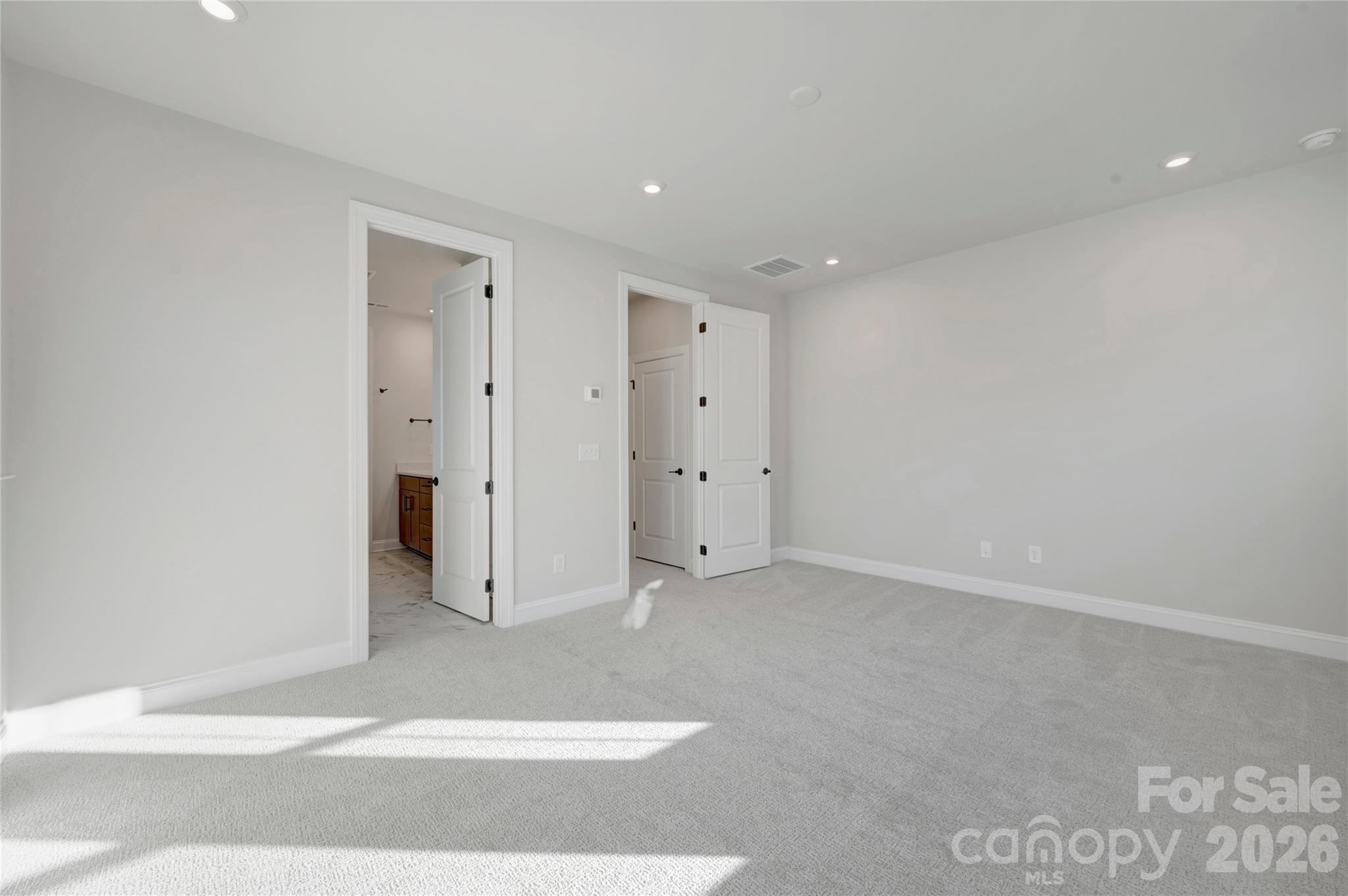 Light filled primary bedroom - 240 Old Town Village Road, Waxhaw