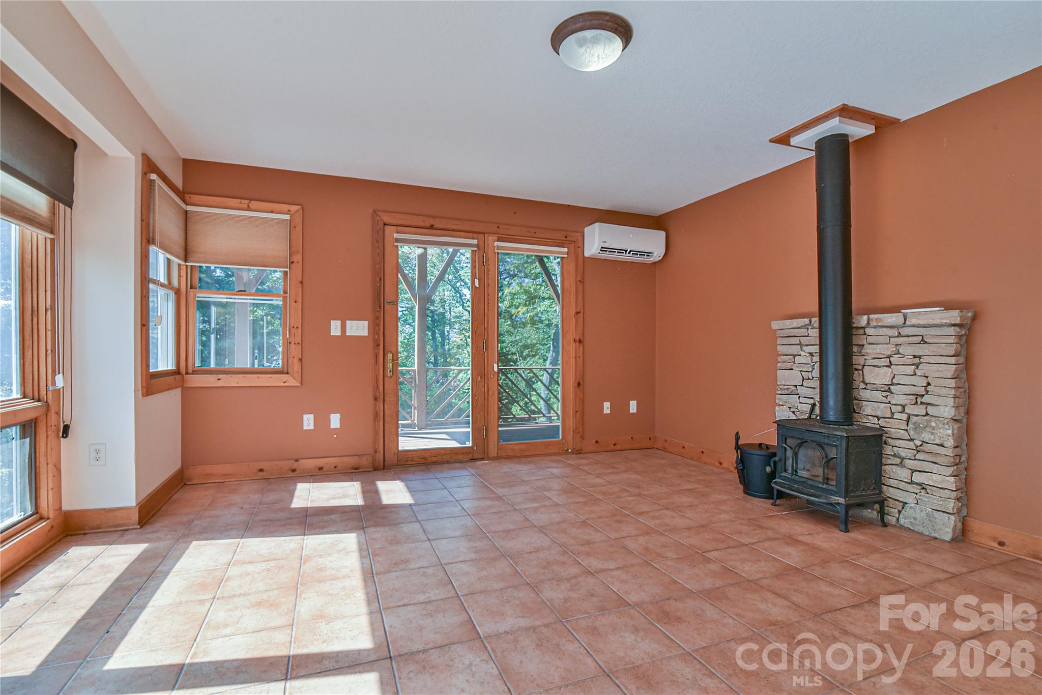 Cozy wood stove in great room - 227 David Ridge Road, Black Mountain