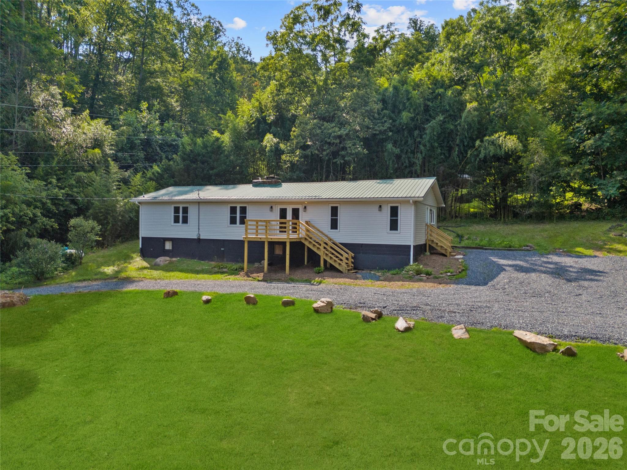 Single Family Residence at 1218 Sweet Creek Road, Bakersville, photo 2 of 27