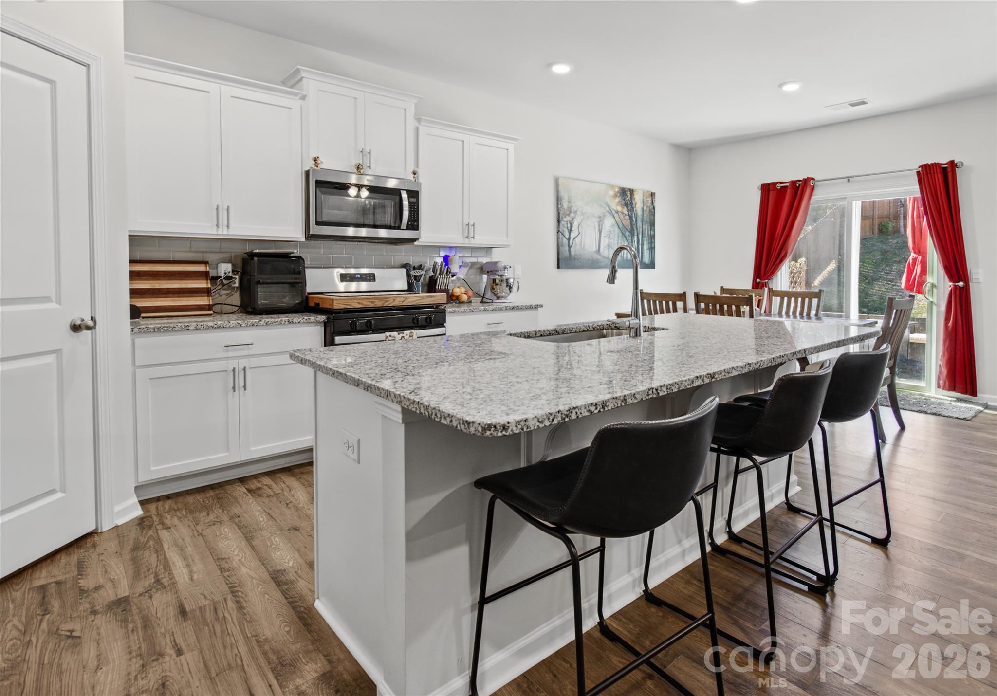 Open floor plan with eat in kitchen - 37 Caitlin Heights Court, Fletcher