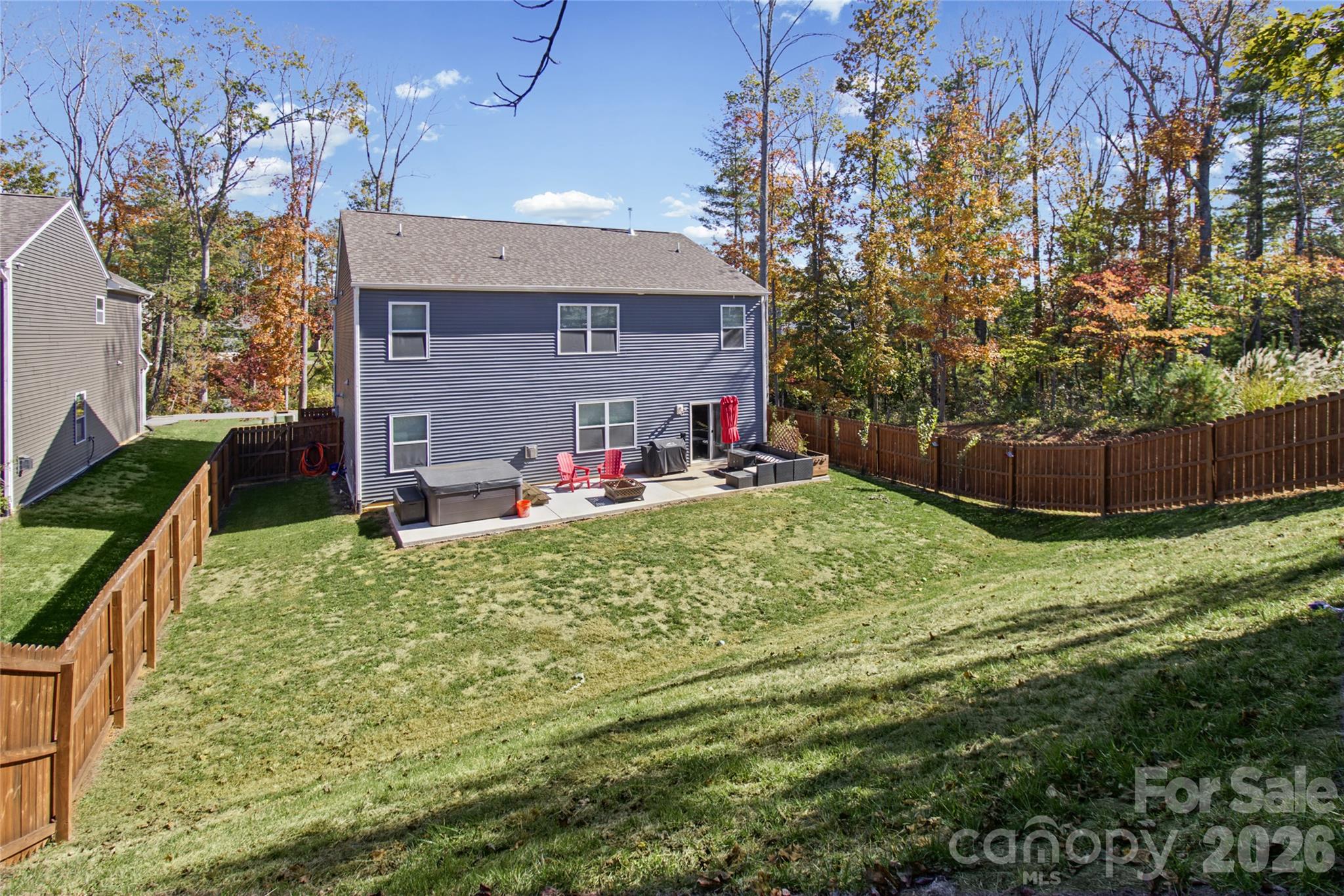 Large backyard w/extended patio upgrade with Hot tub. - 37 Caitlin Heights Court, Fletcher