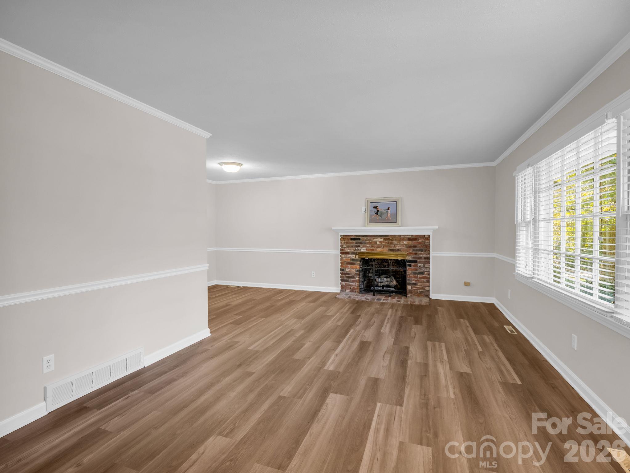 Living room with gas log fireplace. - 2630 Seminole Drive, Hendersonville