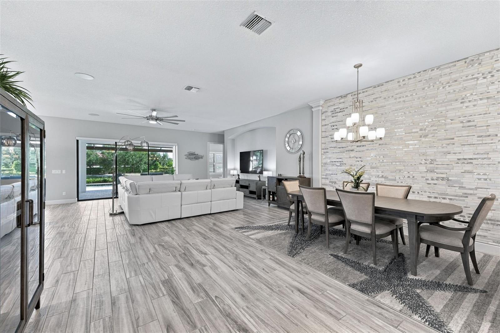 Living Room and Dining Room - 4723 BENITO CT, BRADENTON