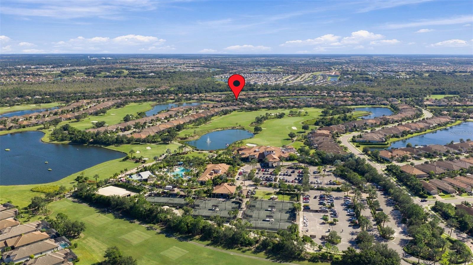 Culinary Center, Wellness Center, Tennis Courts and Resort Pool with tiki in foreground - 4723 BENITO CT, BRADENTON
