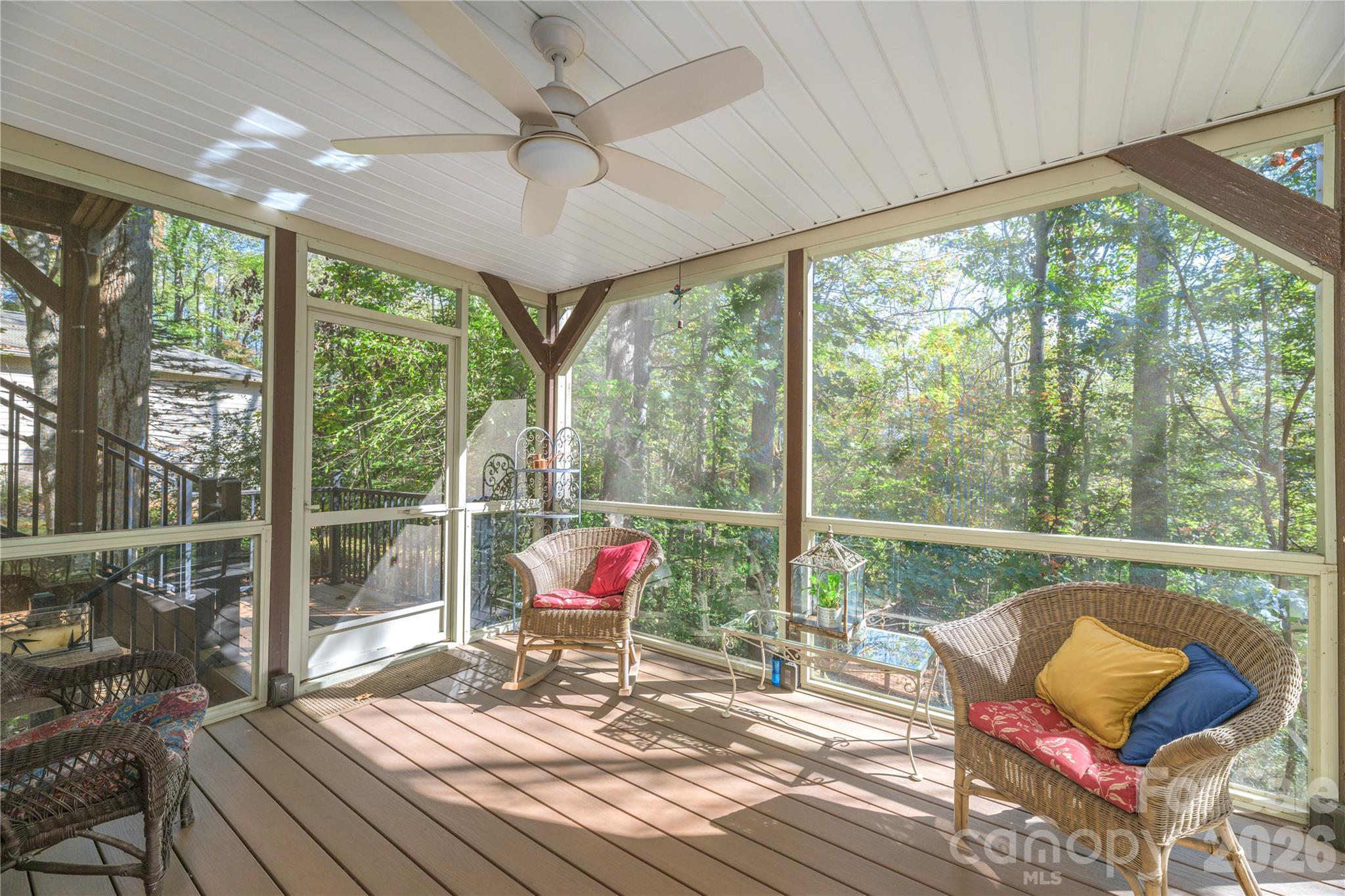Lower level screened in back porch with exit to back yard and overlook deck. This home has plenty of outdoor areas to enjoy. - 6 Eagles Nest Lane, Asheville