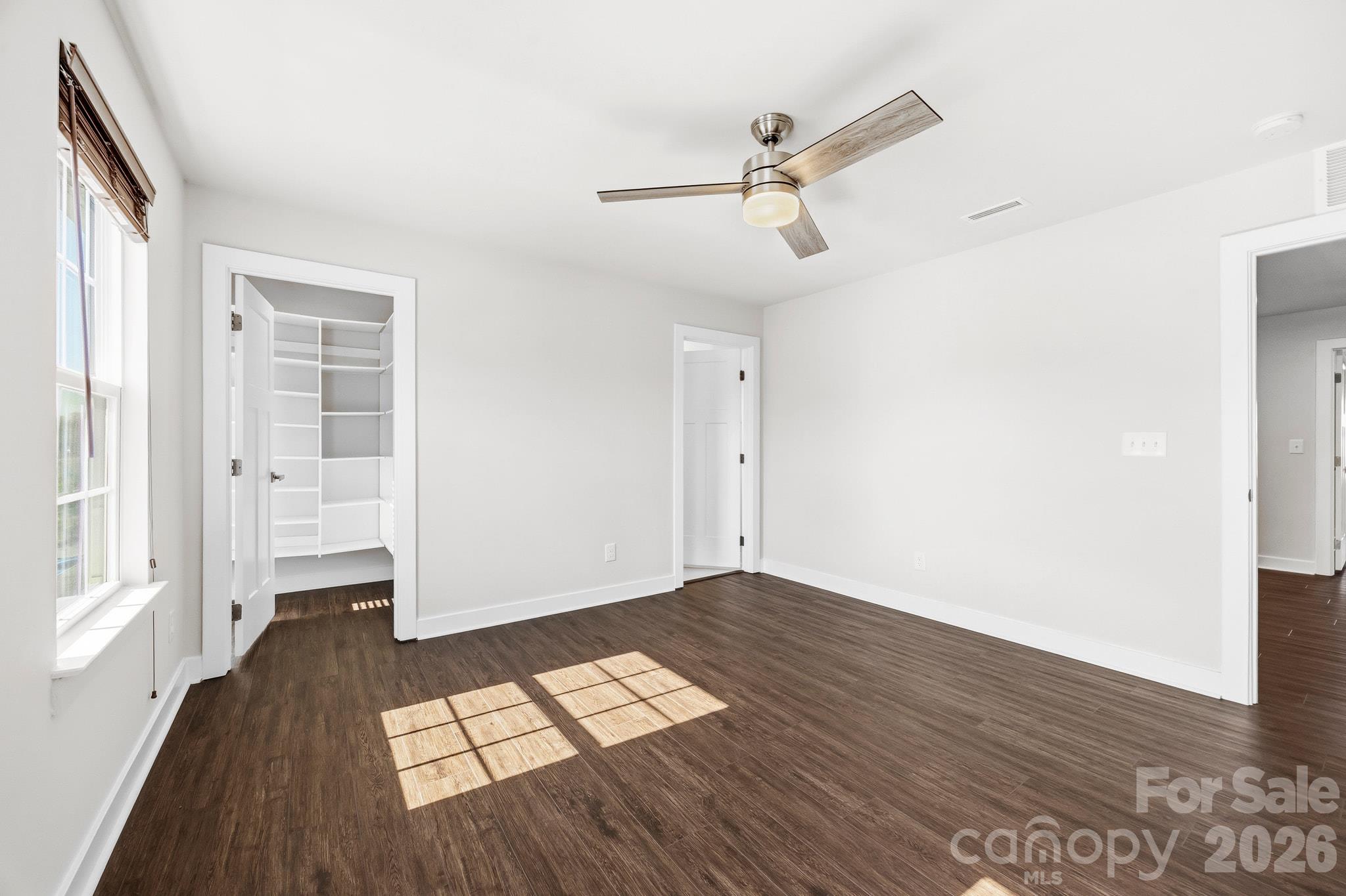 secondary ensuite bedroom with a walk in closet. - 6192 Holland Street, Fort Mill