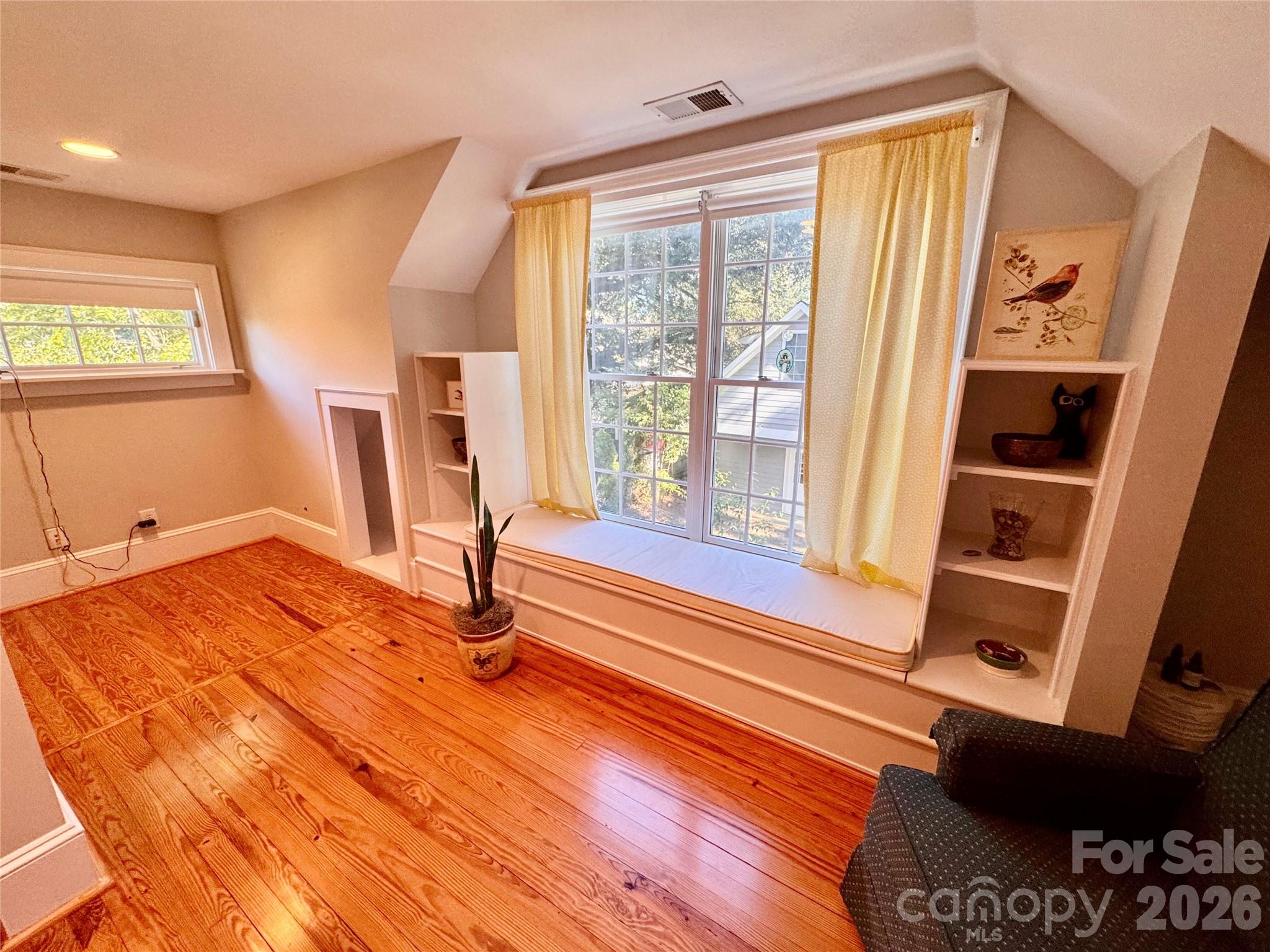 Flex space-built-ins and the window bench seat with storage. - 139 Louise Drive SE, Concord