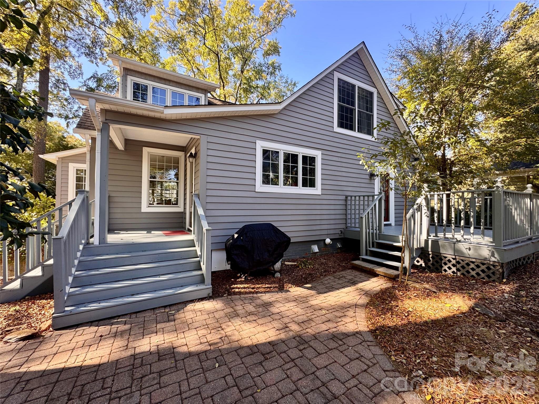 View of back porch entry and patio space to the deck - 139 Louise Drive SE, Concord