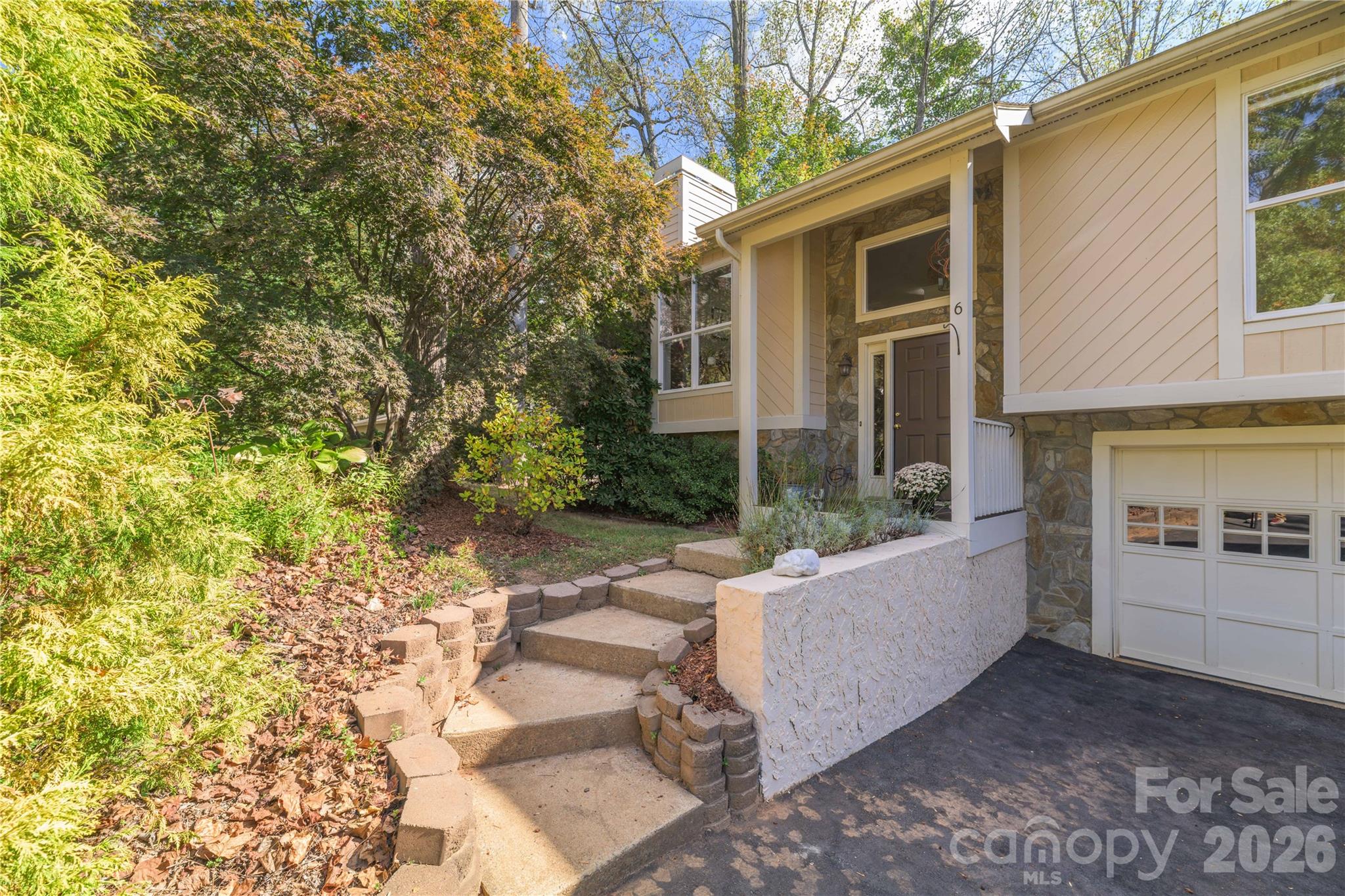 Just a few steps to the covered doorway. New asphalt on the large driveway for your guests. - 6 Eagles Nest Lane, Asheville