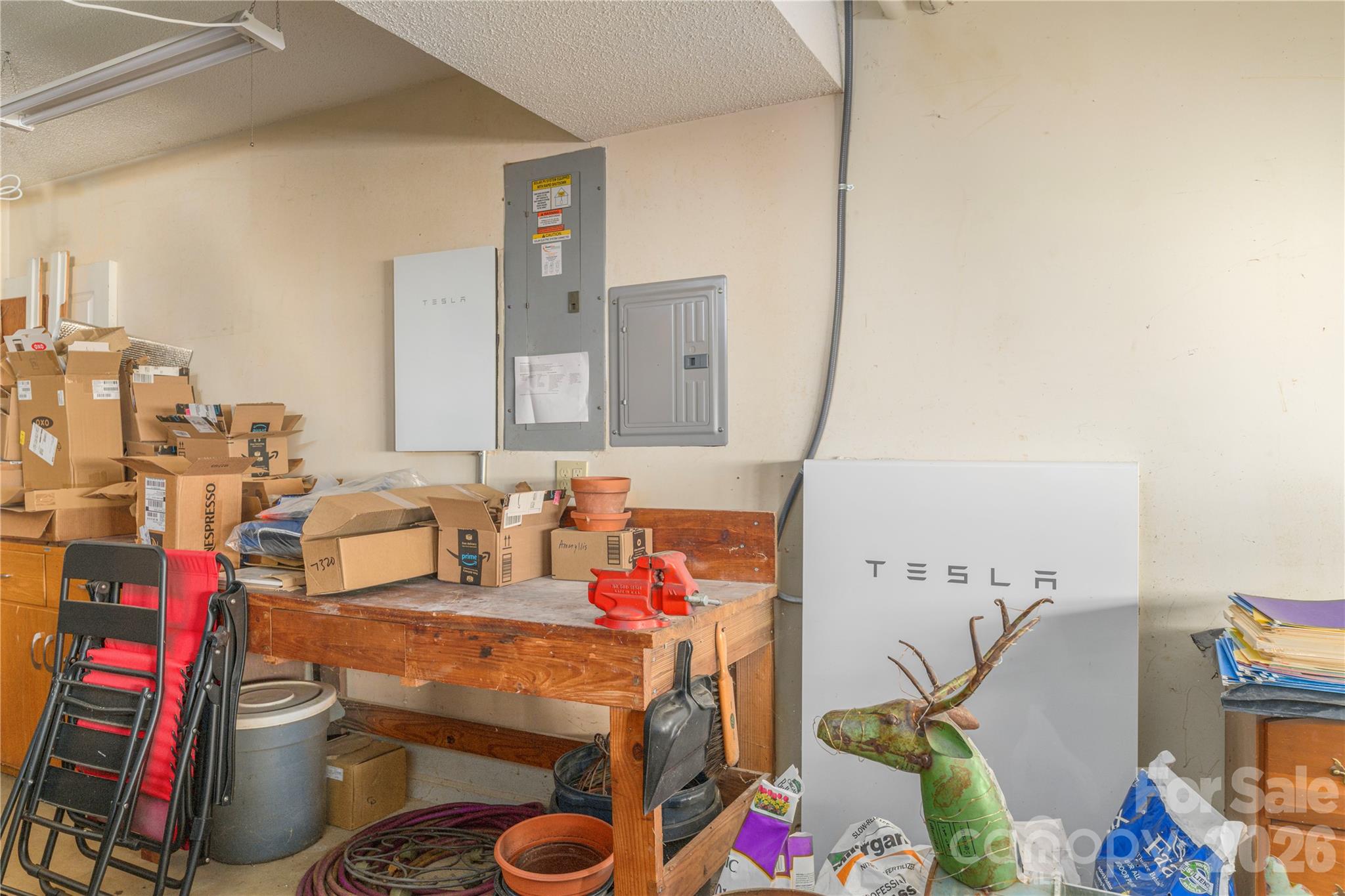 Garage housing the circuit breakers and Tesla Wall and Battery. - 6 Eagles Nest Lane, Asheville