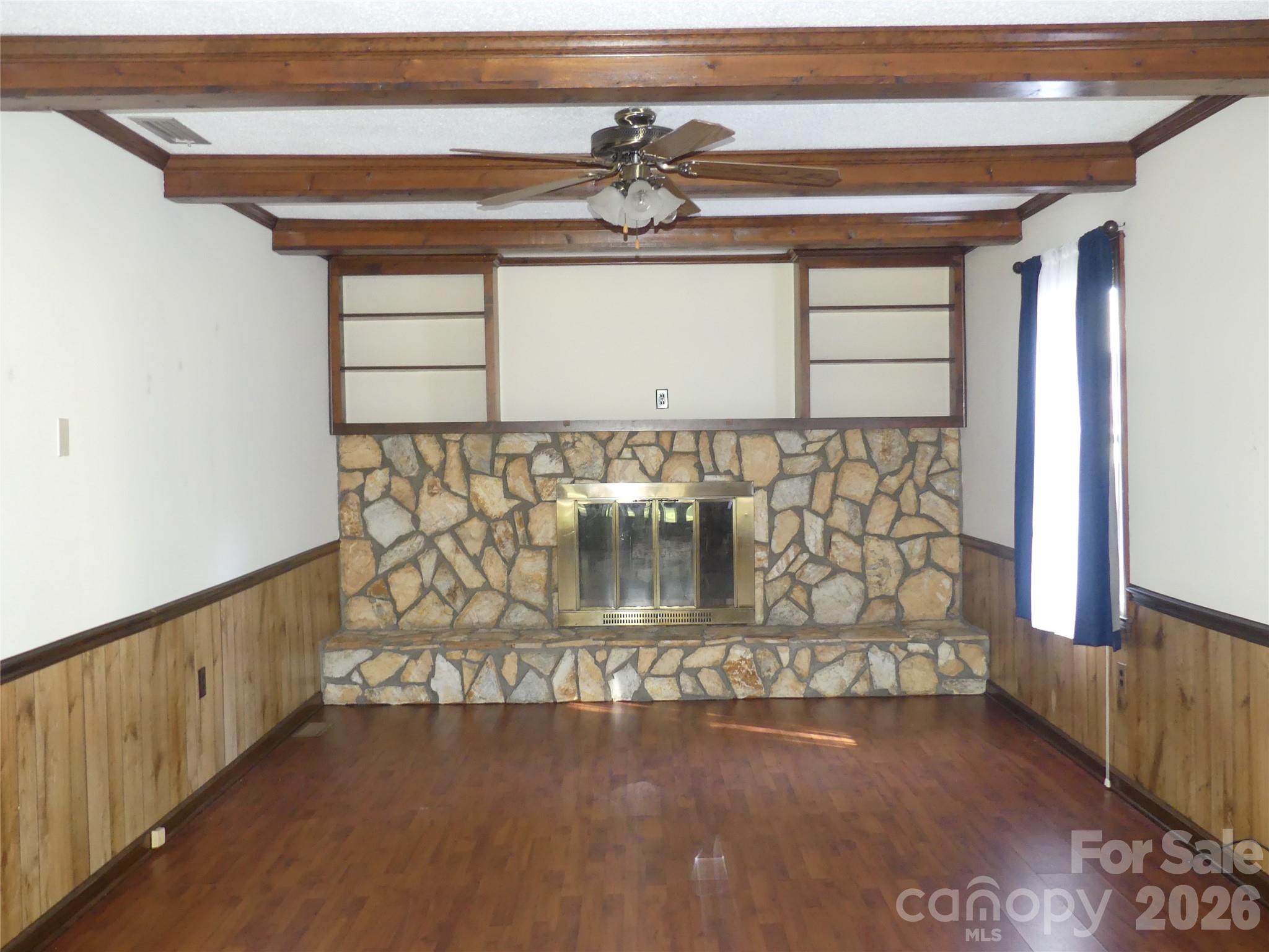 Den. Fireplace fueled by propane. Currently no tank. - 7871 Howard Avenue, Kannapolis