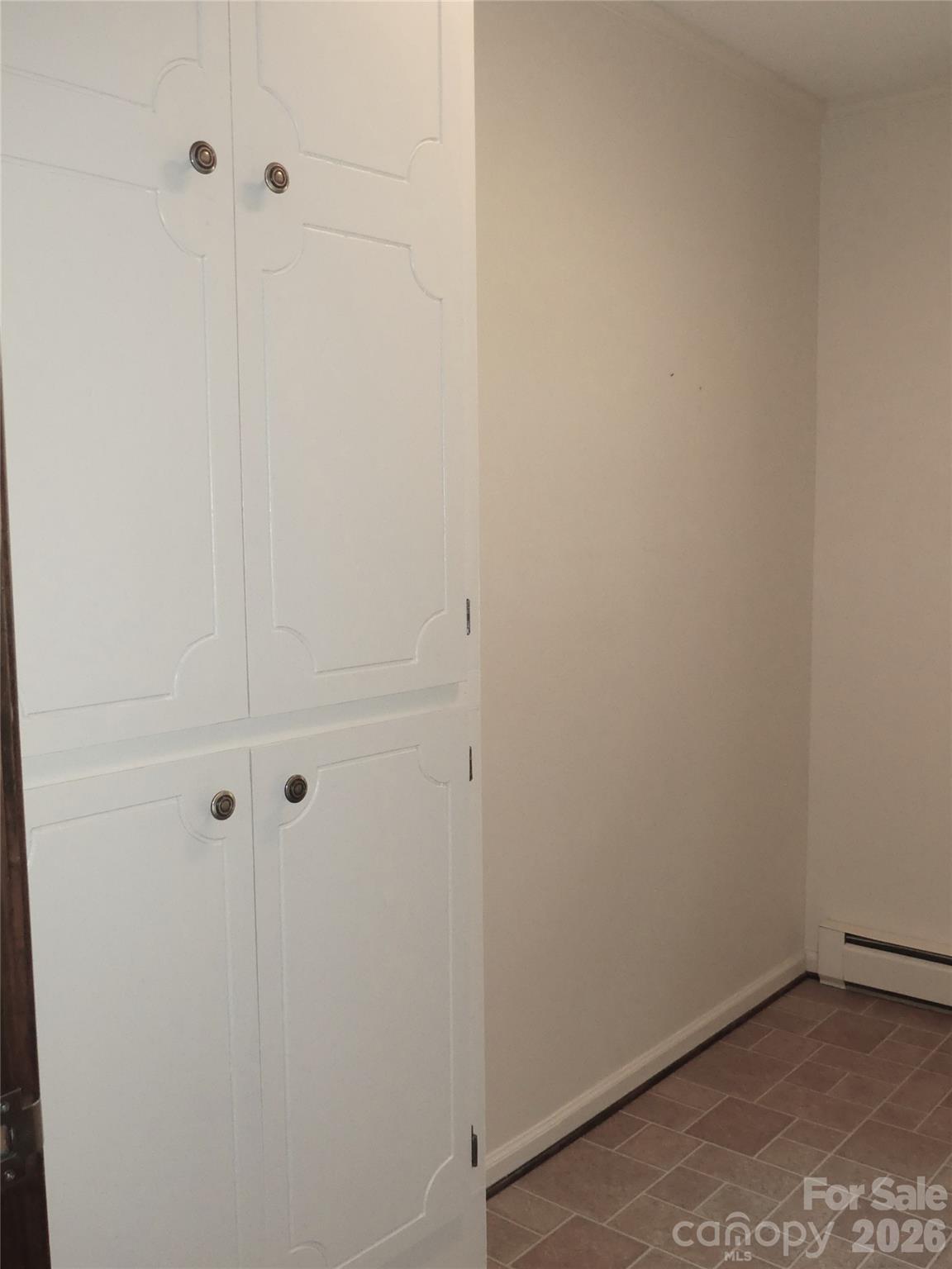 Closet storage in utility room. - 7871 Howard Avenue, Kannapolis