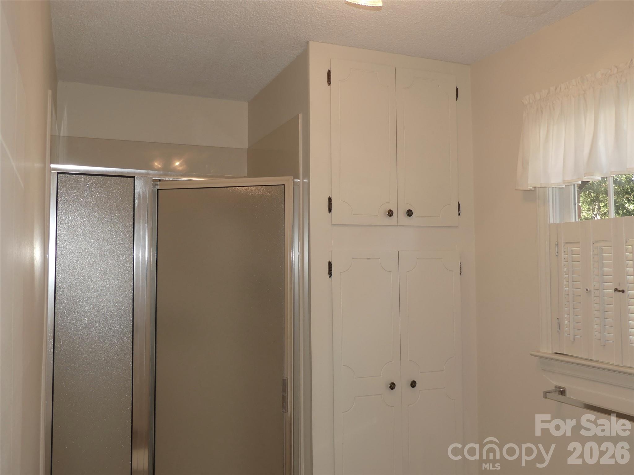Bath 2 adjoins bedroom 2. - 7871 Howard Avenue, Kannapolis