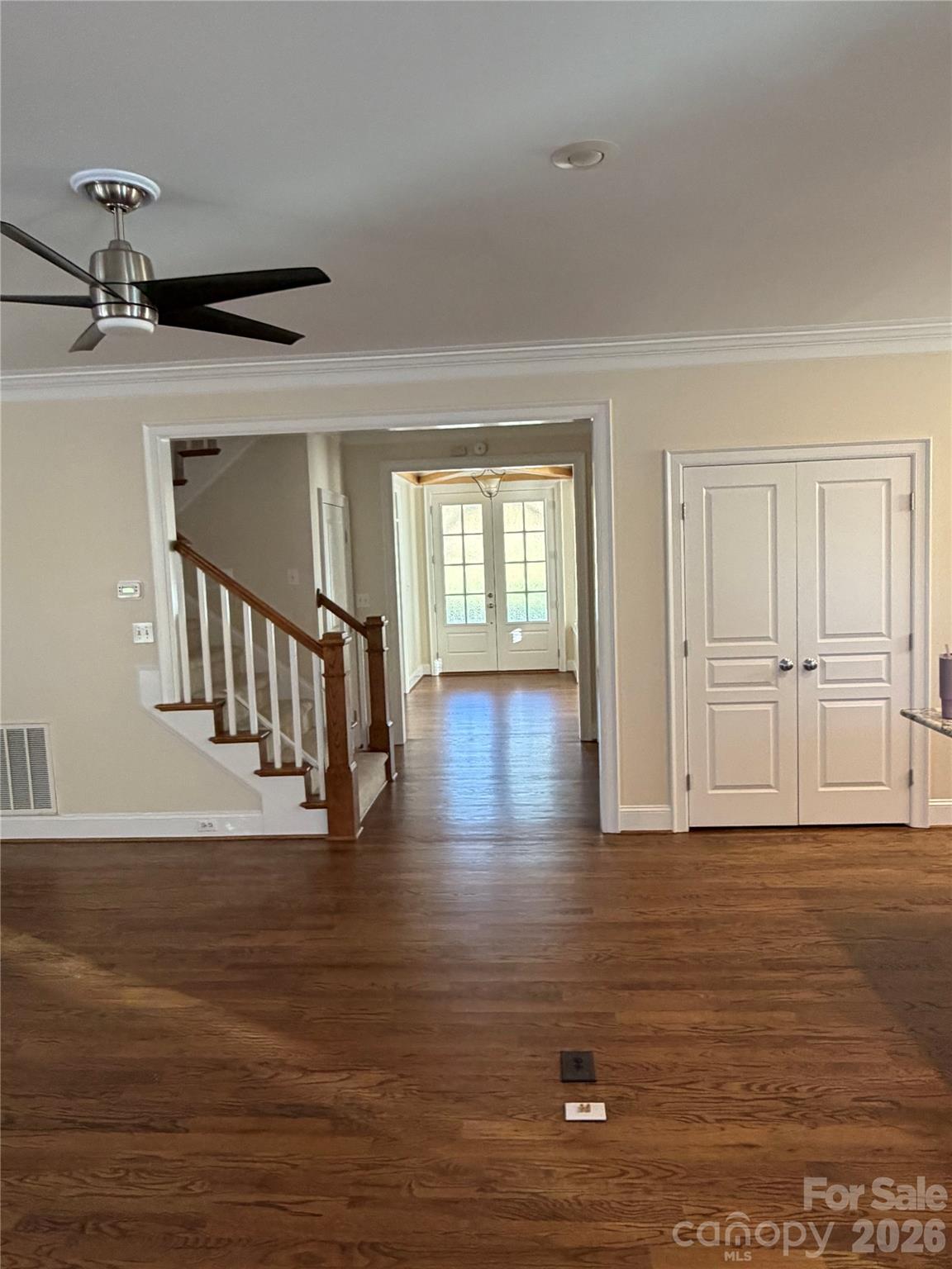 View of entry from living room, also shows the food pantry closet - 4095 Principal Circle NW, Conover