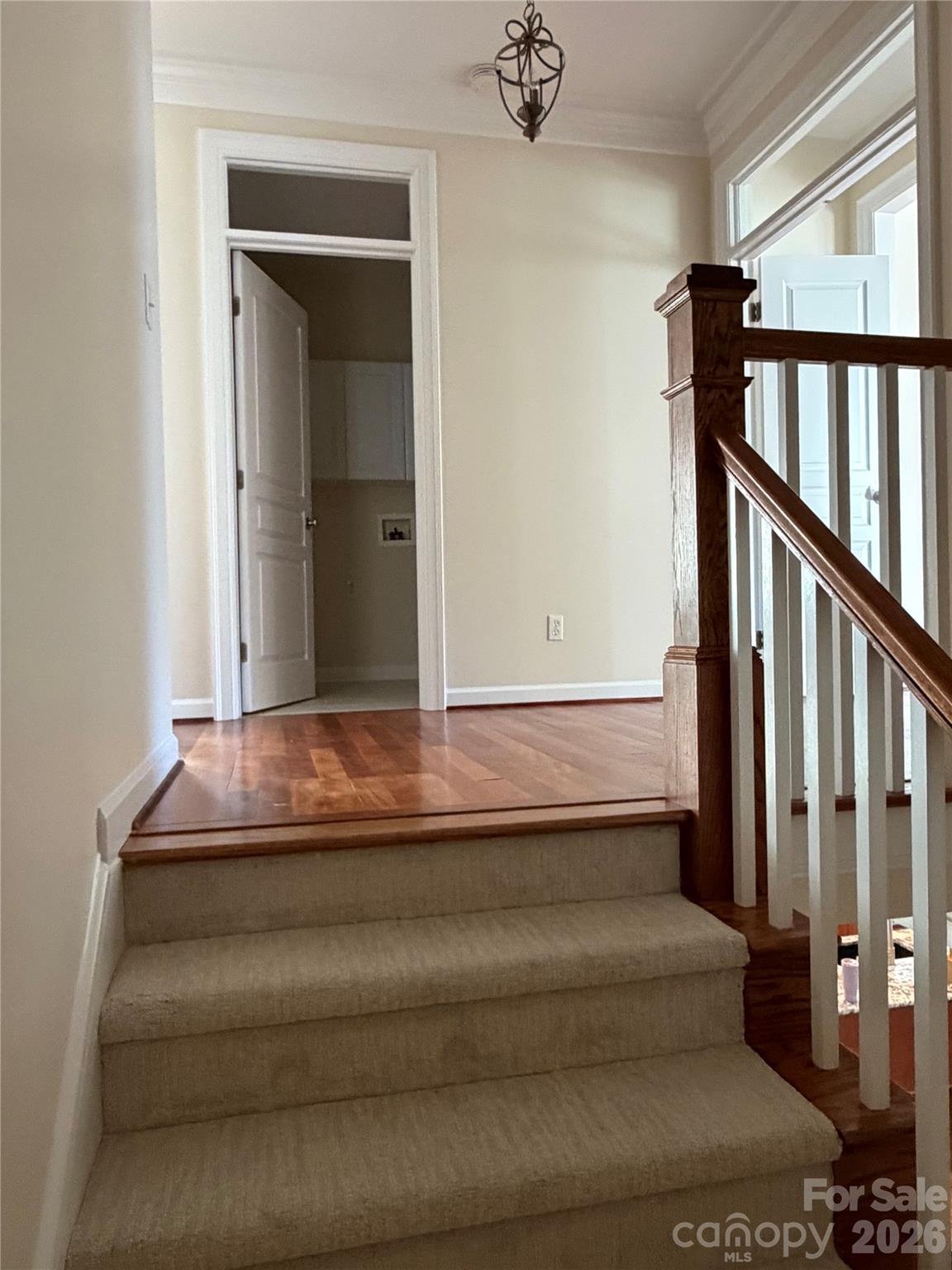 Stairwell view from 2nd landing going upstairs - 4095 Principal Circle NW, Conover