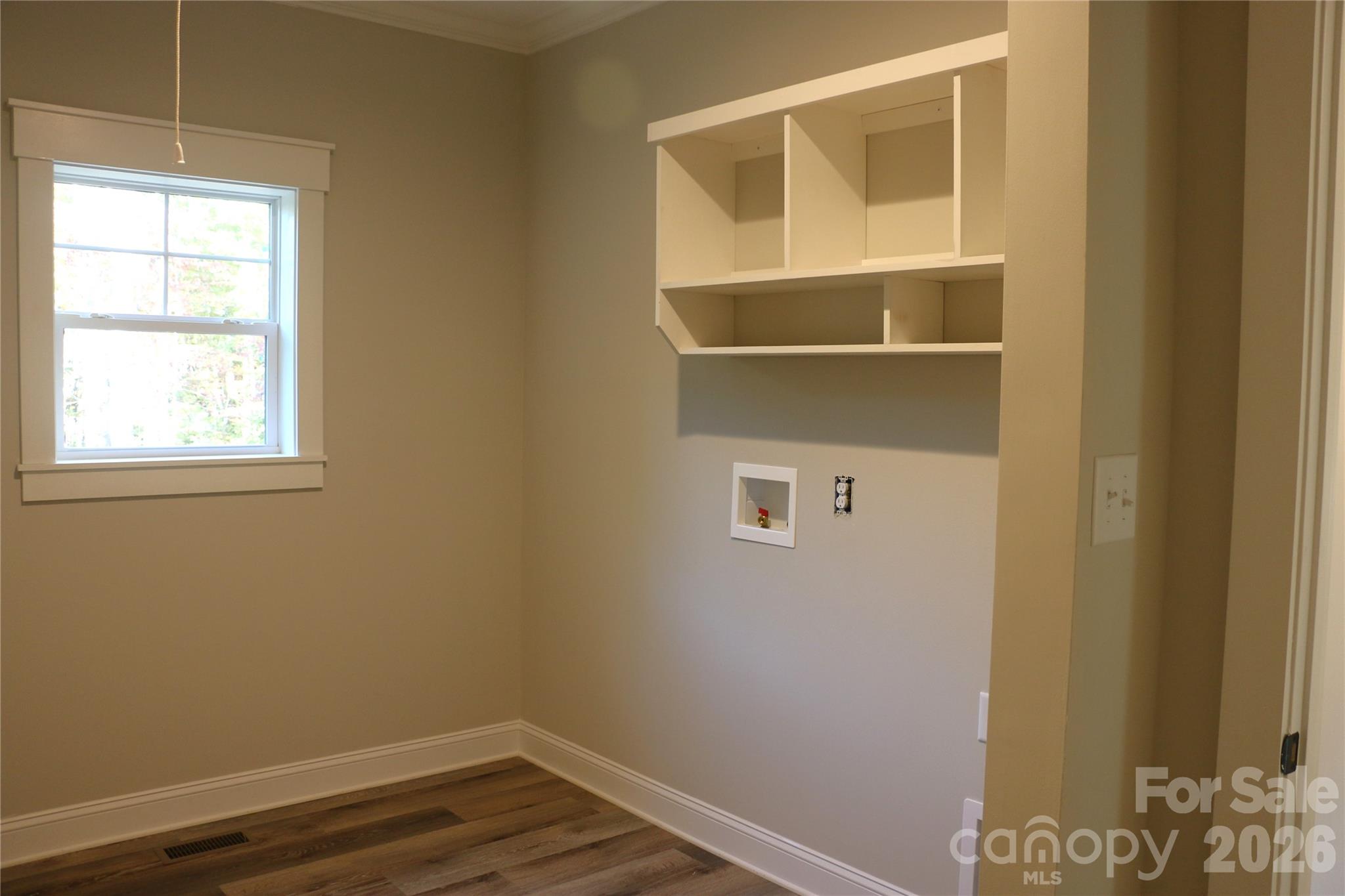 BUILT IN SHELVES IN LAUNDRY ROOM - 210 Rocky Mount Drive, Lake Lure