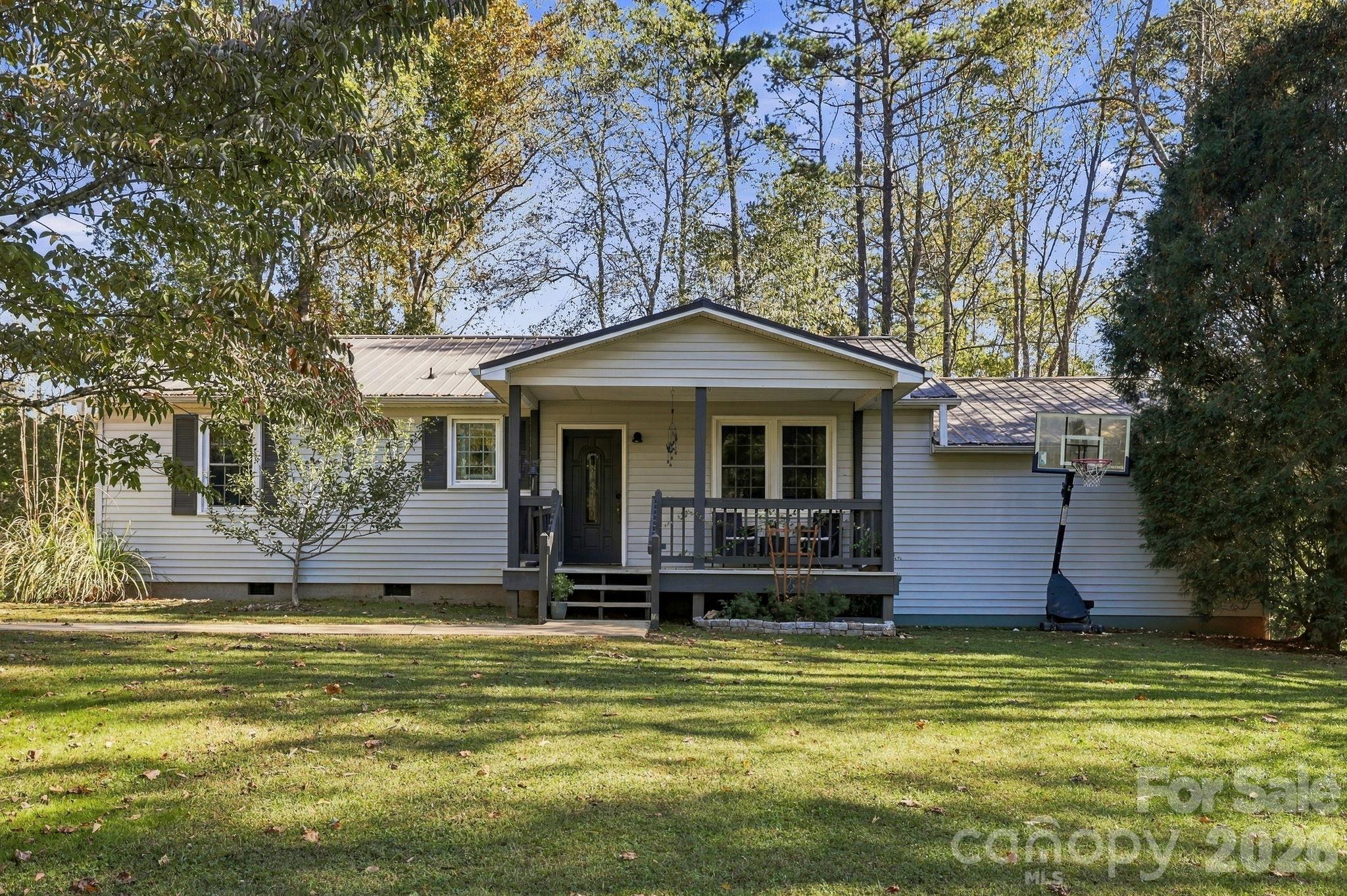Single Family Residence at 6 Gun Flint Trail, Fletcher, photo 2 of 38