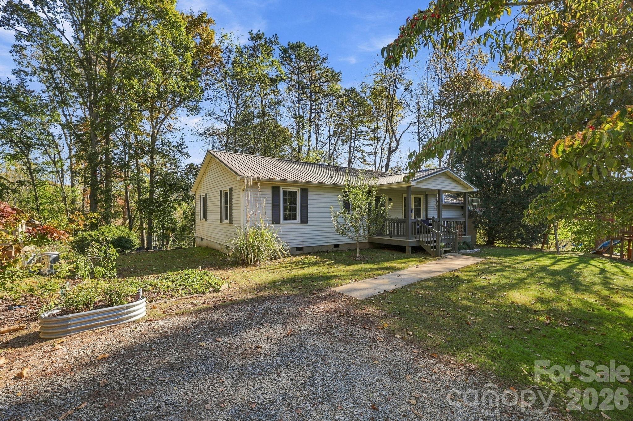 Single Family Residence at 6 Gun Flint Trail, Fletcher, photo 3 of 38