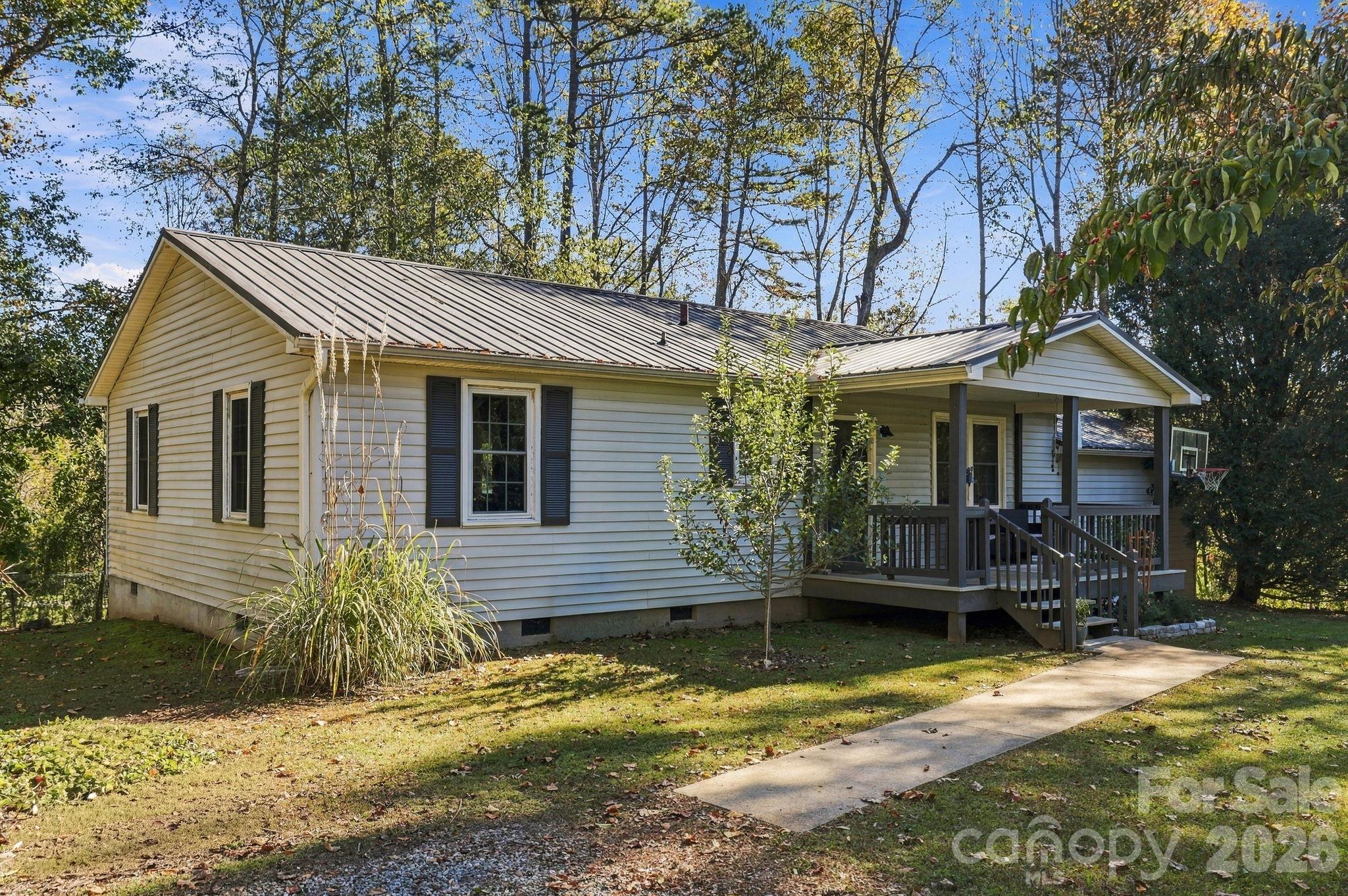 Single Family Residence at 6 Gun Flint Trail, Fletcher, photo 4 of 38