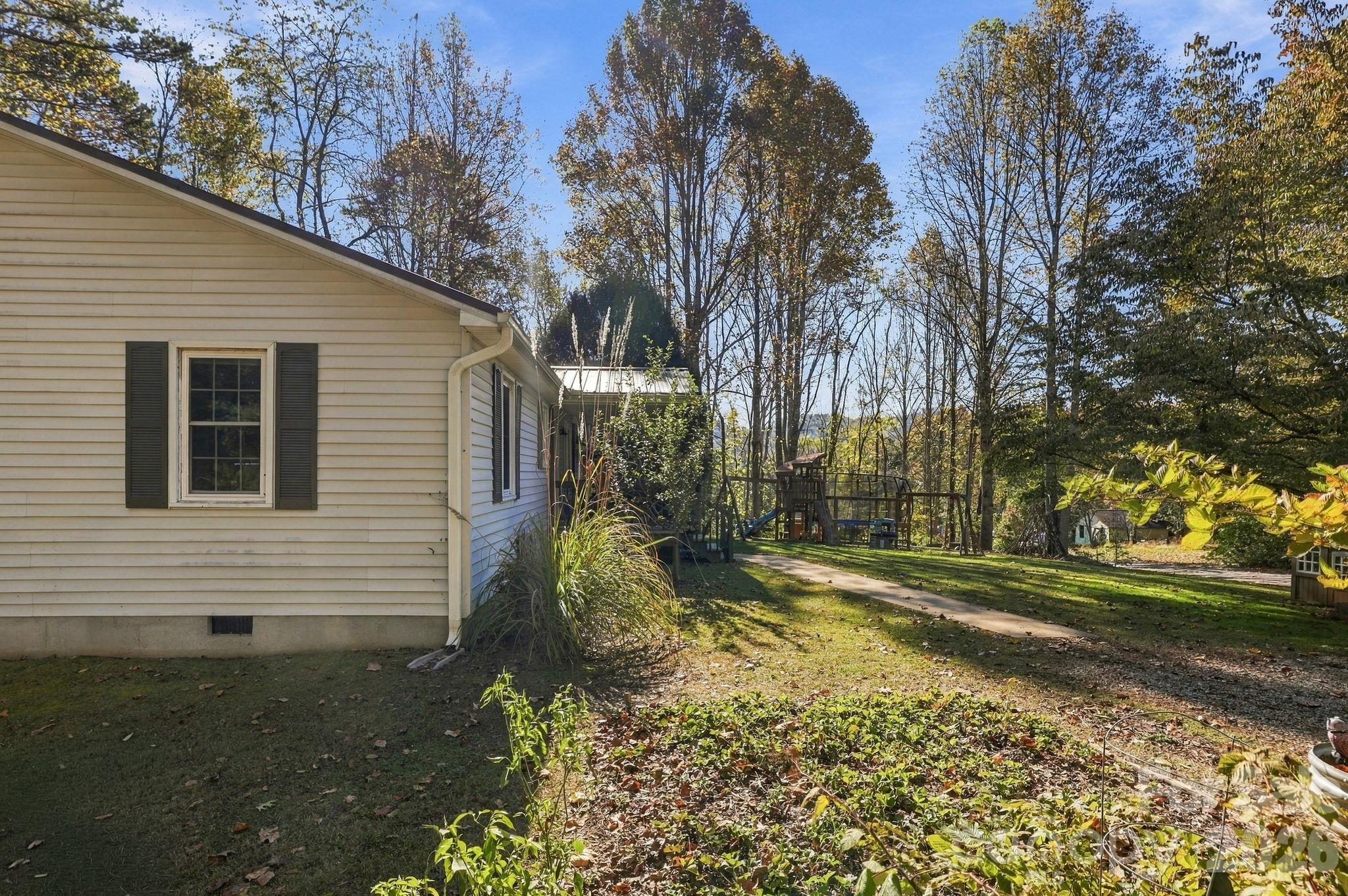 Single Family Residence at 6 Gun Flint Trail, Fletcher, photo 35 of 38
