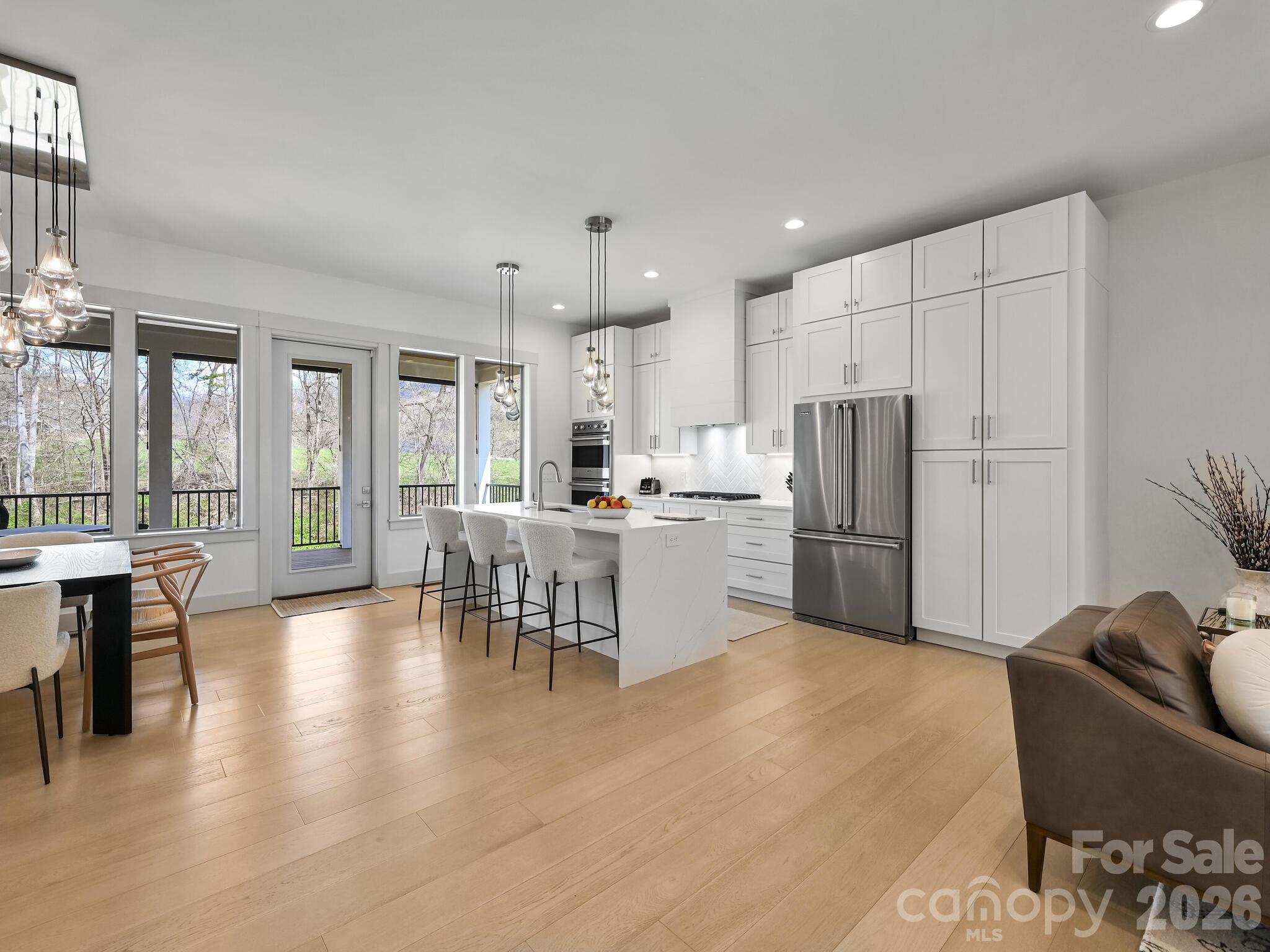 Kitchen and dining areas. - 18 Sagewood Drive, Candler