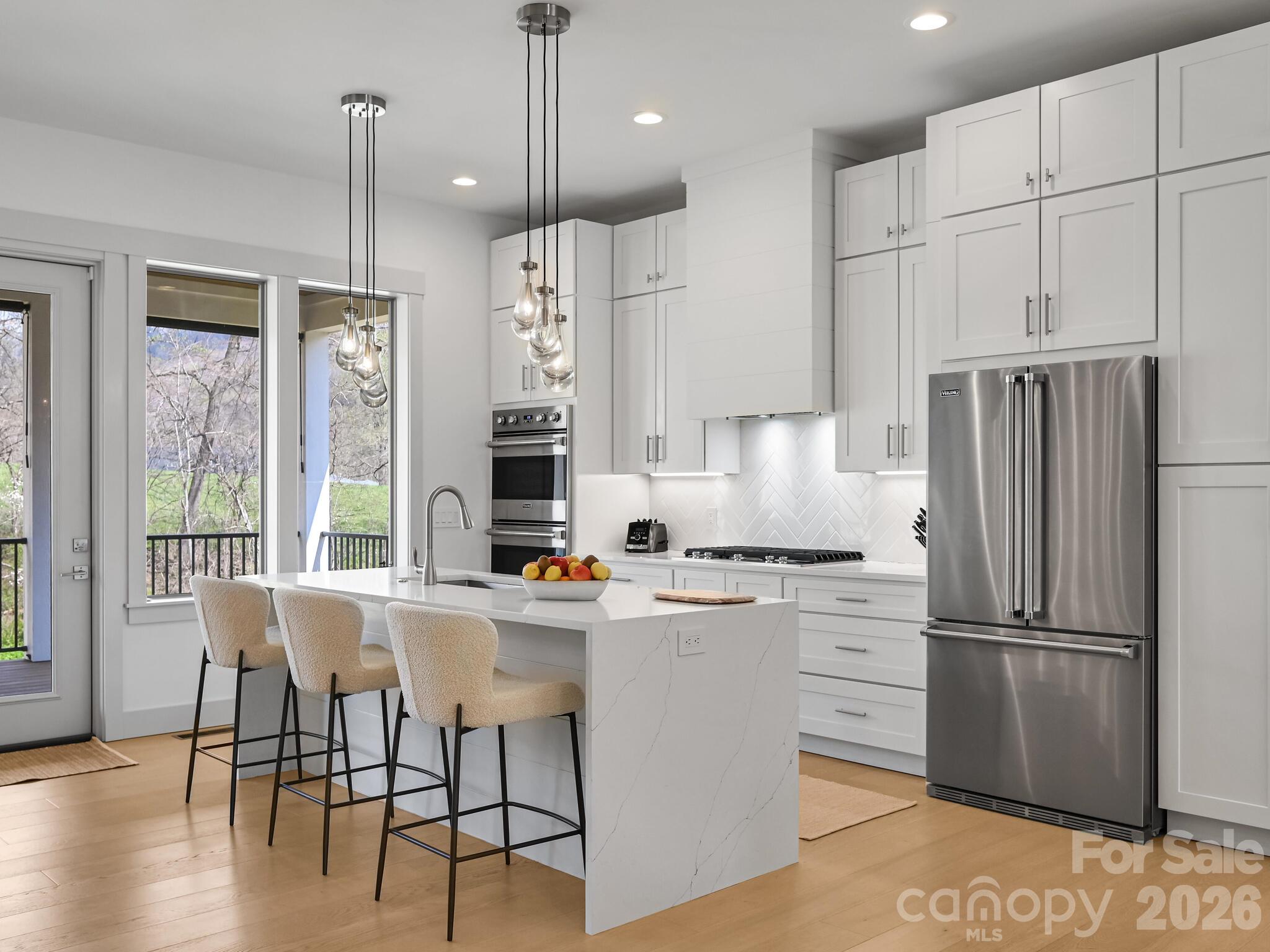 Beautiful island for prep and seating. - 18 Sagewood Drive, Candler