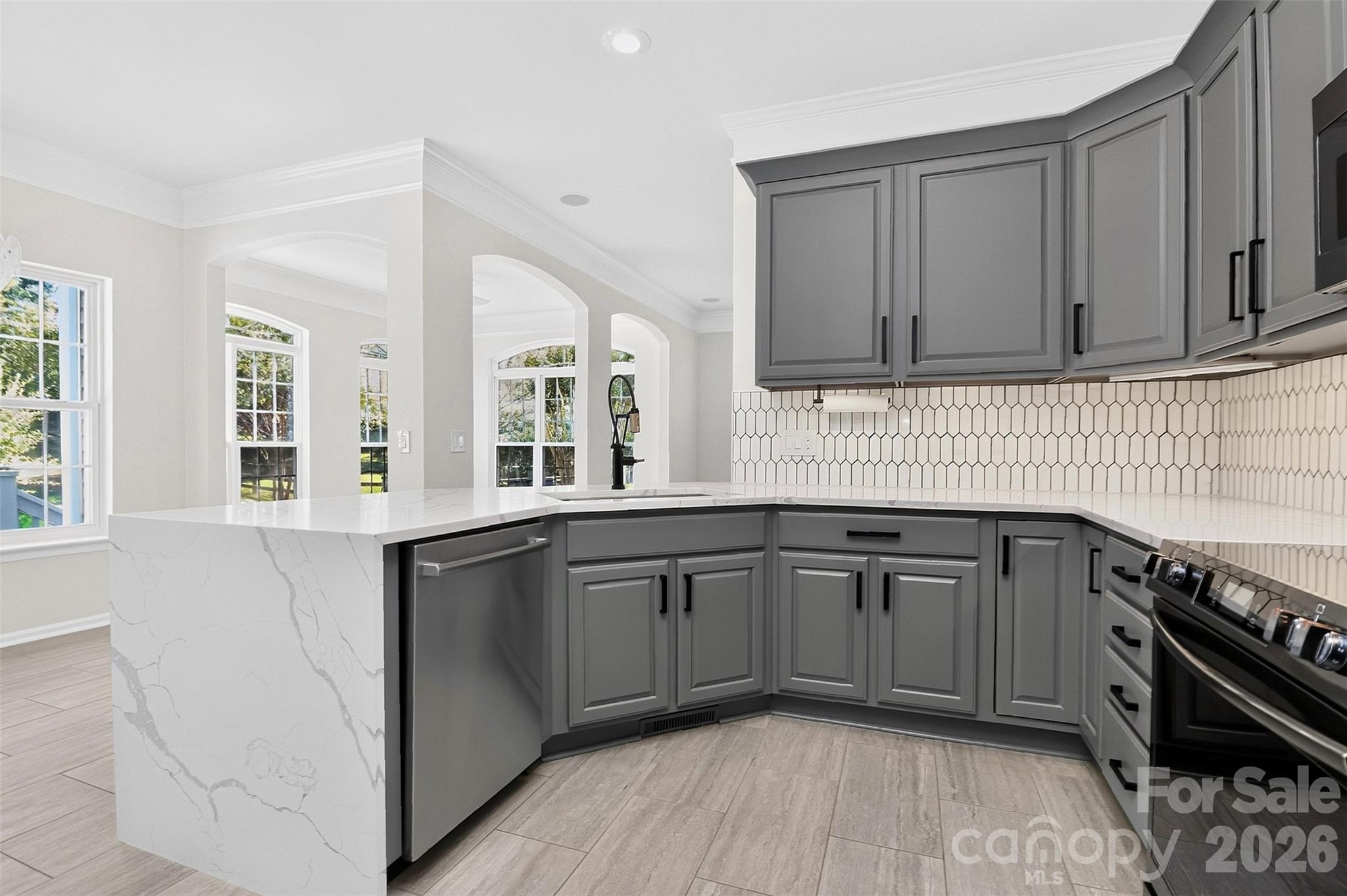 Renovated Kitchen (2021) - Quartz countertops w/ waterfall edge - 11519 Baystone Place, Concord