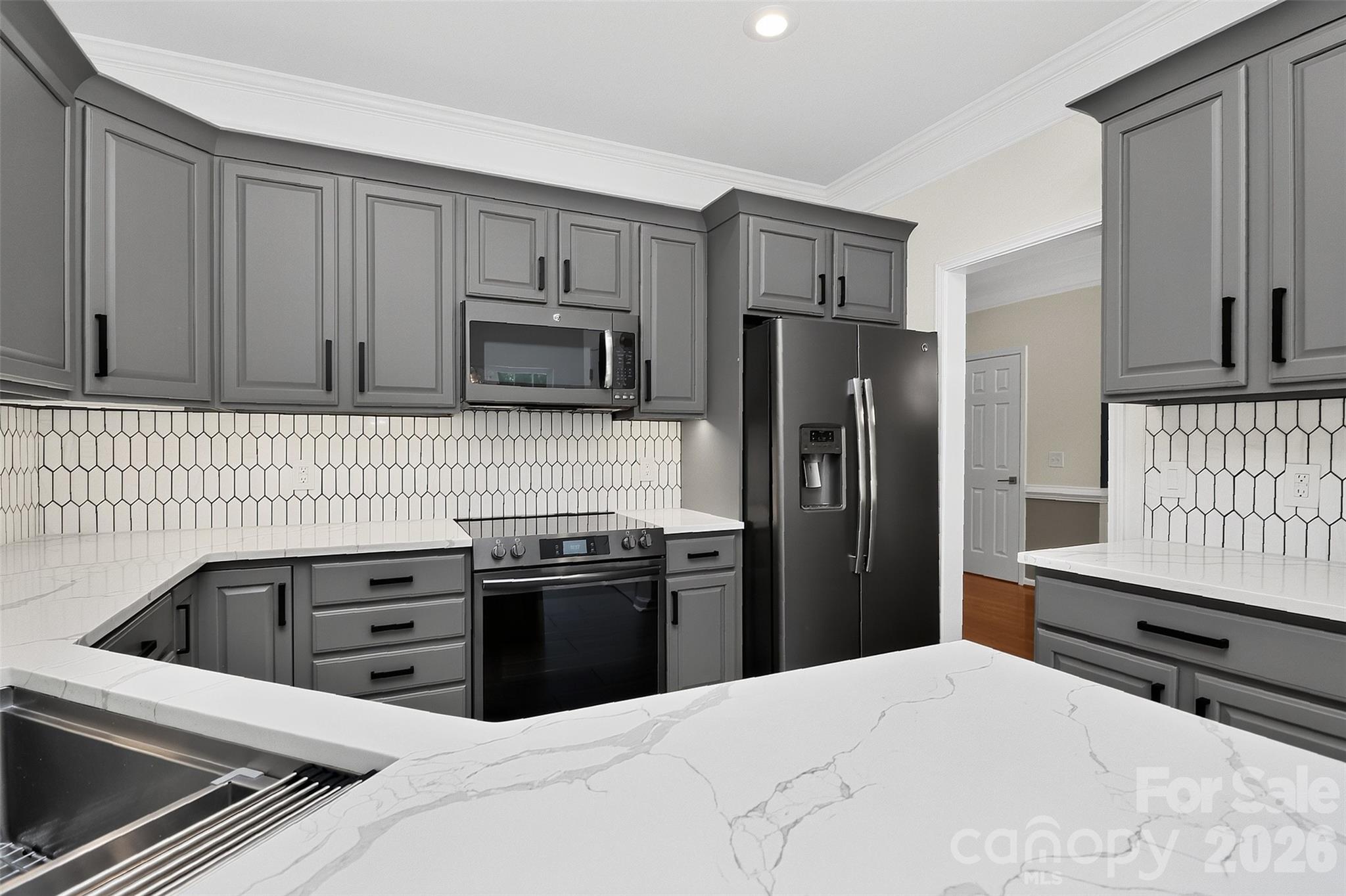 Sink has an edge perfect for a cutting board or drying rack - 11519 Baystone Place, Concord