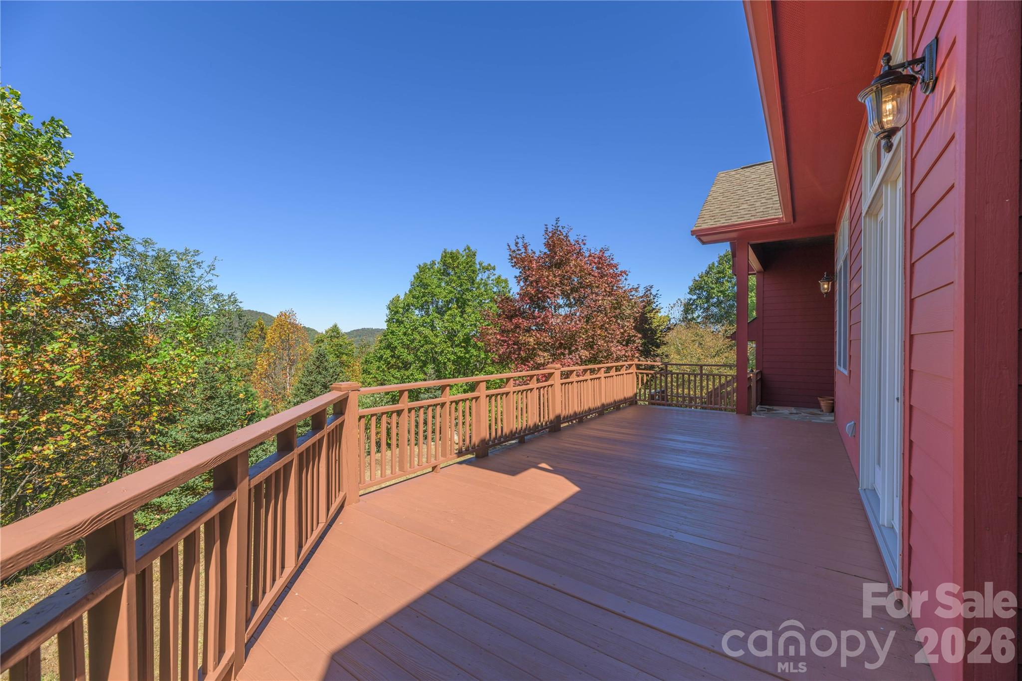Deck spans the front of the house to enjoy the views - 1341 Double Knob Drive, Arden