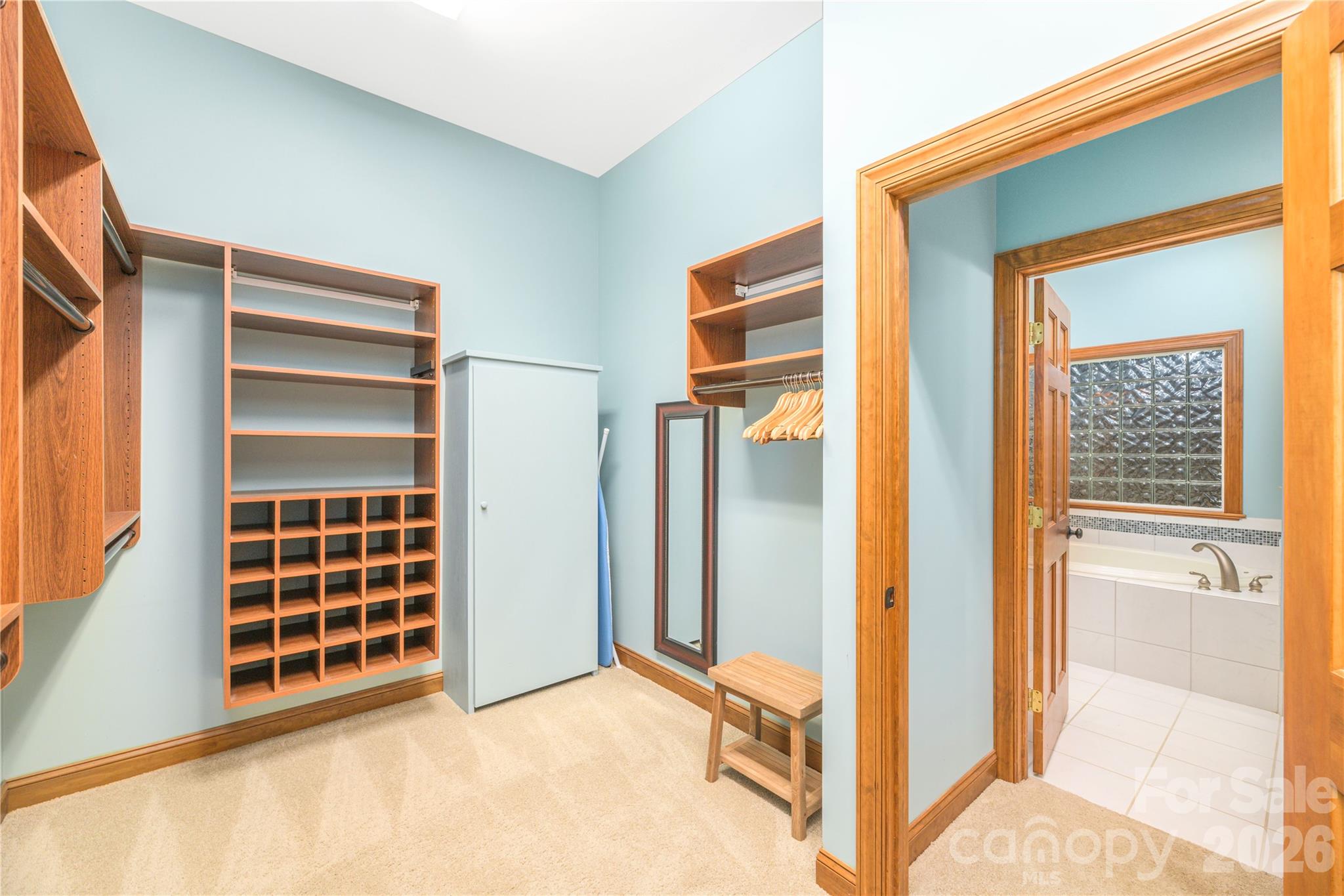Dressing room with custom built-ins - 1341 Double Knob Drive, Arden