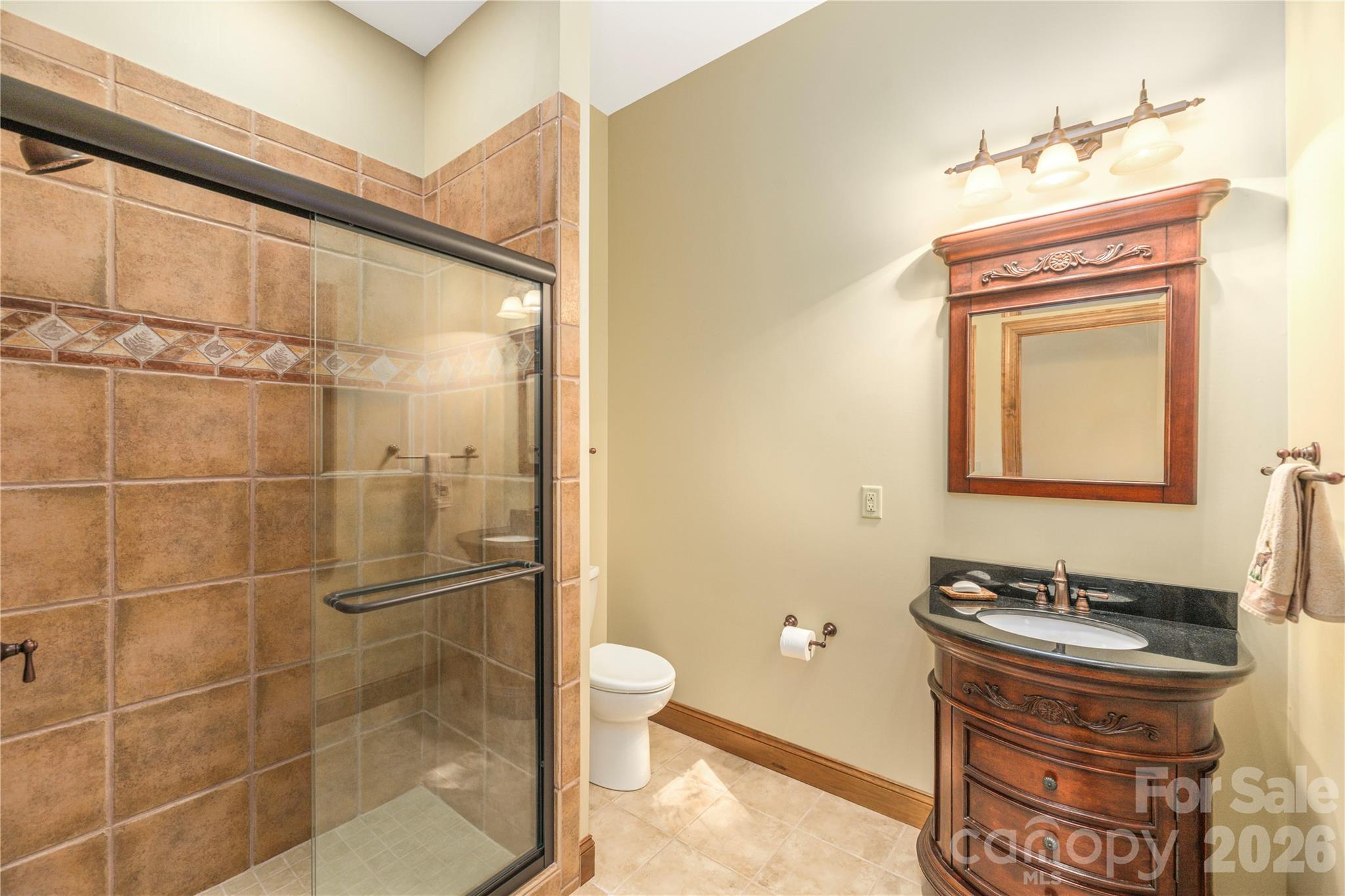 Second full bathroom on main - 1341 Double Knob Drive, Arden