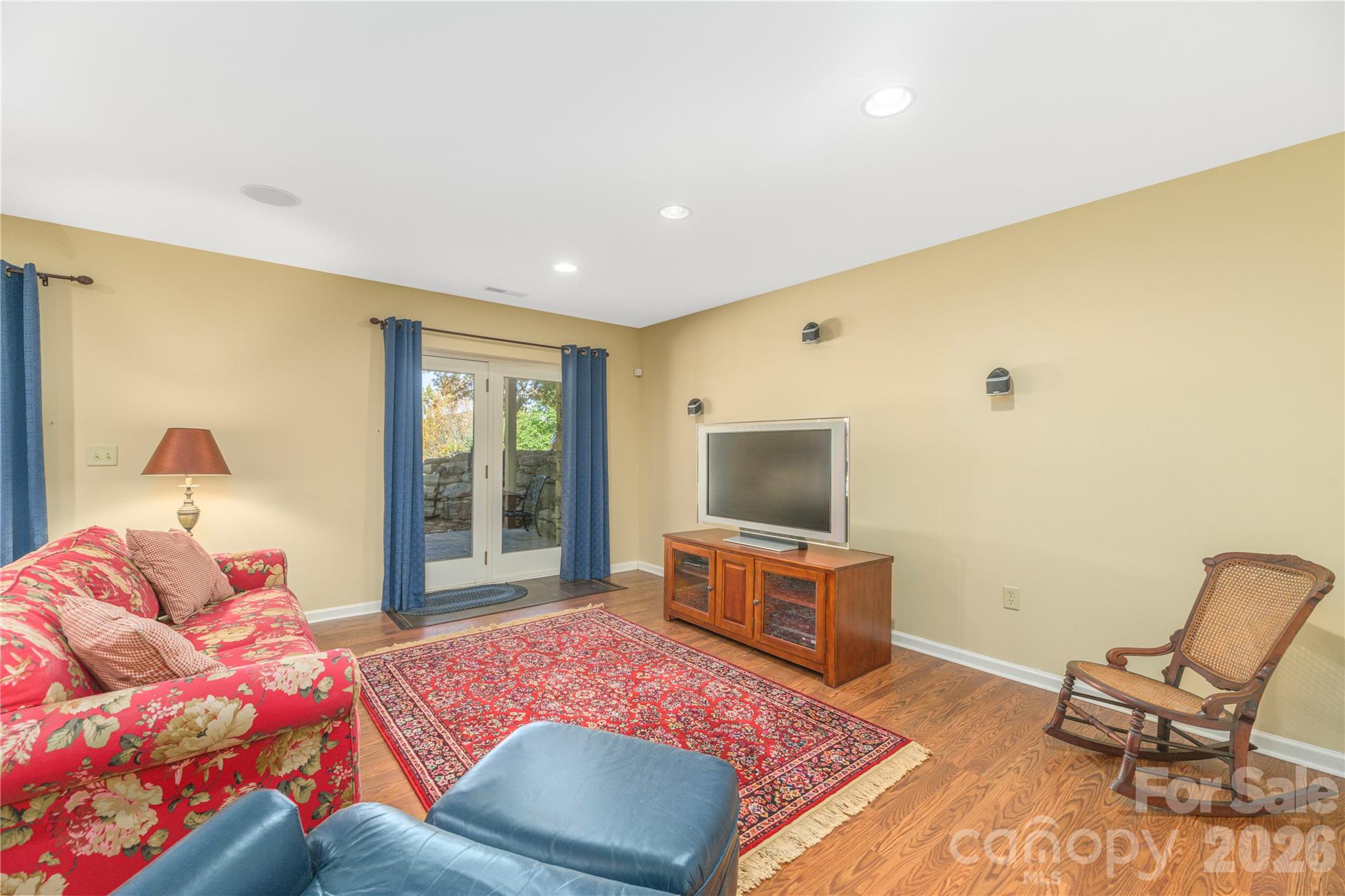 High ceilings, and natural light in den - 1341 Double Knob Drive, Arden