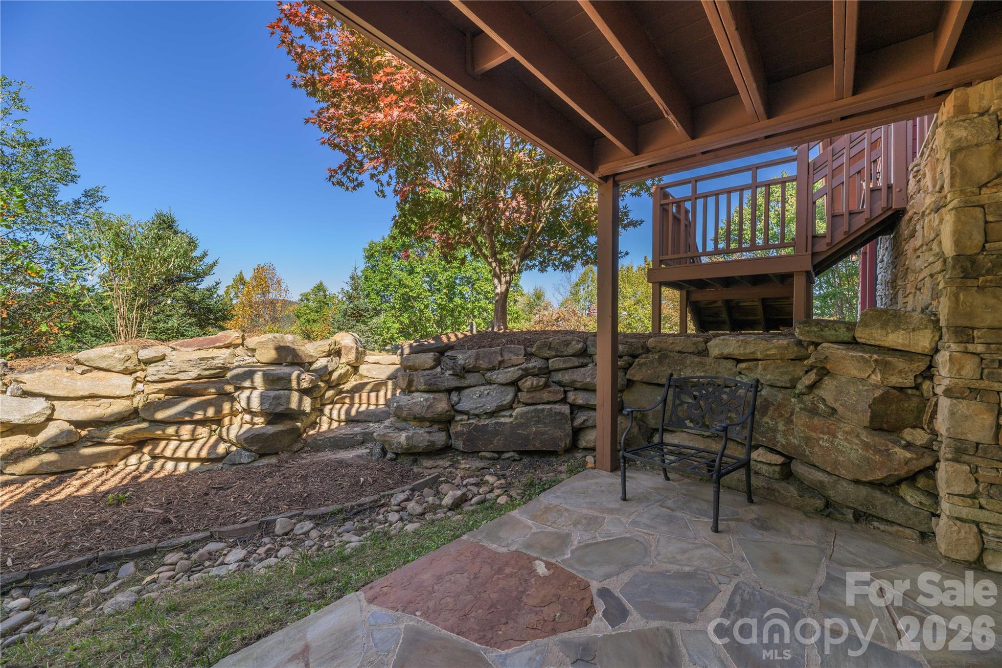 Stone patio outside of den - 1341 Double Knob Drive, Arden