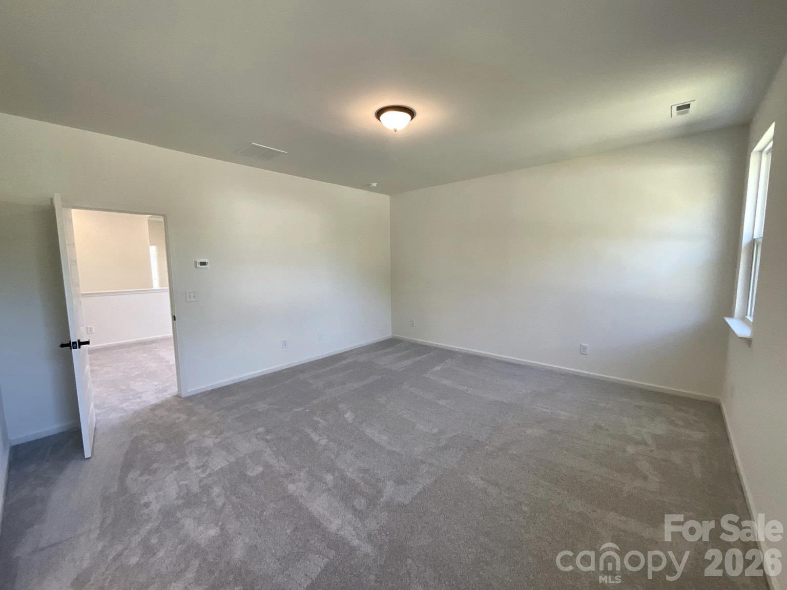 Primary bedroom which accommodates a king size bed and more. - 534 Ramona Street, York