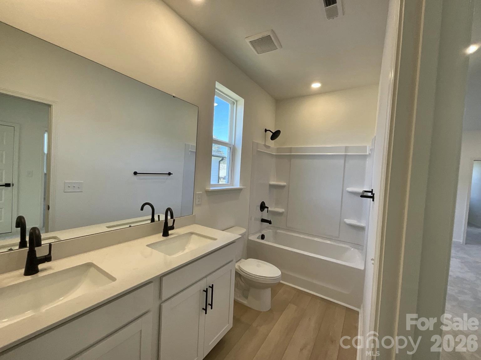 Upstairs guest bathroom includes double sinks. - 534 Ramona Street, York