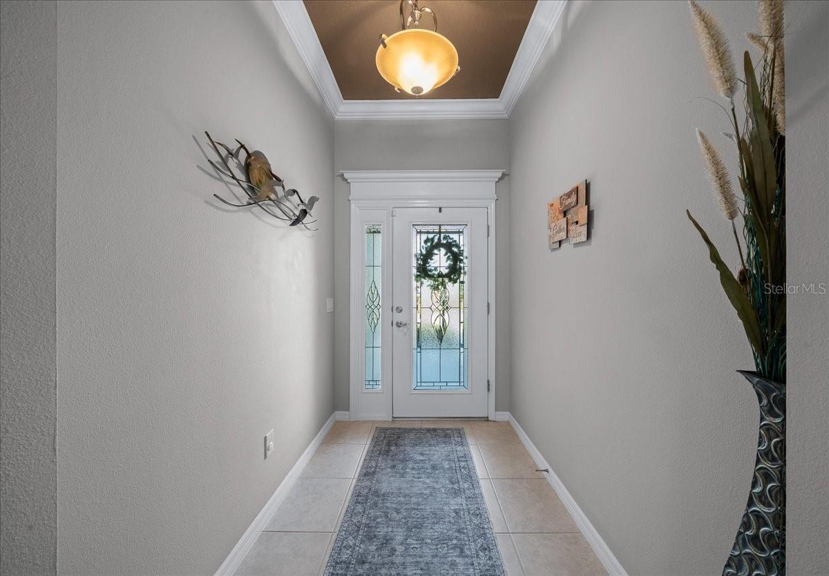 Leaded Glass Front Door and Ceramic Tile in Entrance - 3335 VELTRE WAY, THE VILLAGES