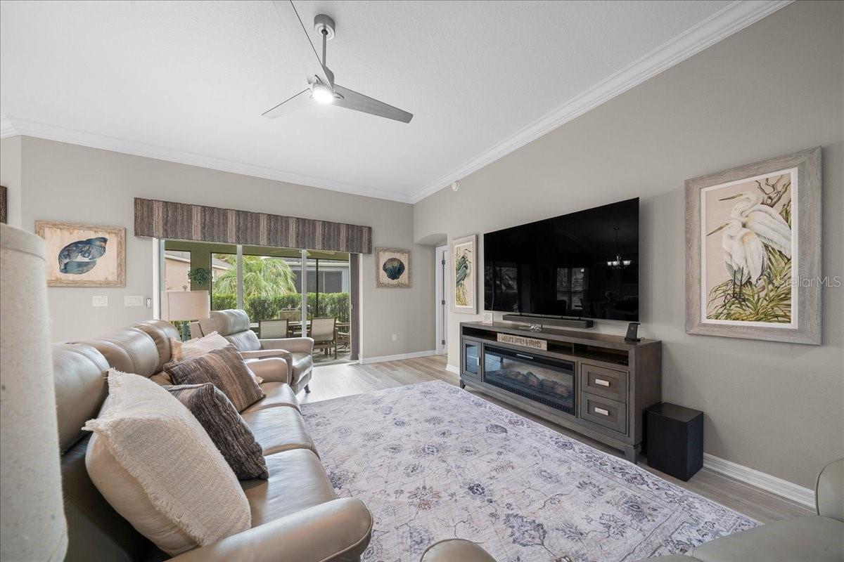 Living Room Features Crown Molding & Updated Fan / Light - 3335 VELTRE WAY, THE VILLAGES