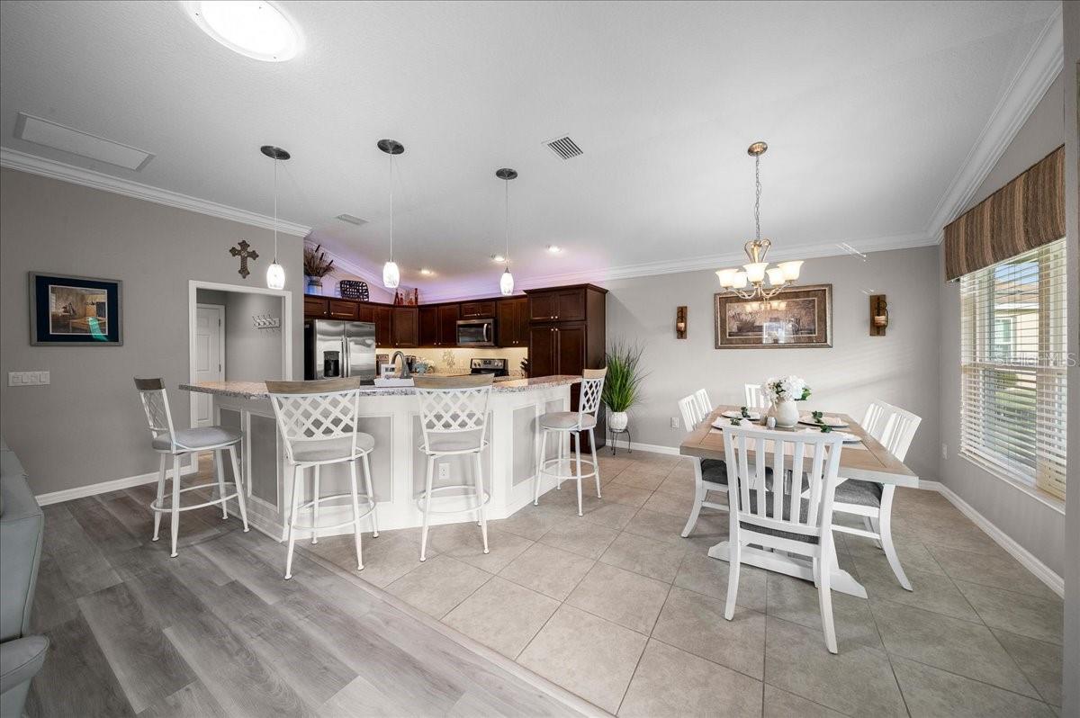 Crown Molding and Custom Wainscoting on Kitchen Island - 3335 VELTRE WAY, THE VILLAGES