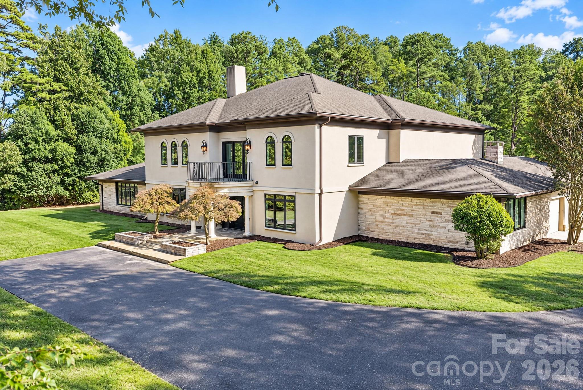 The 7200+ sf  home offers exceptional space and verssatility, perfect for large gatherings and entertaining. - 1340 Sardis Road N, Charlotte