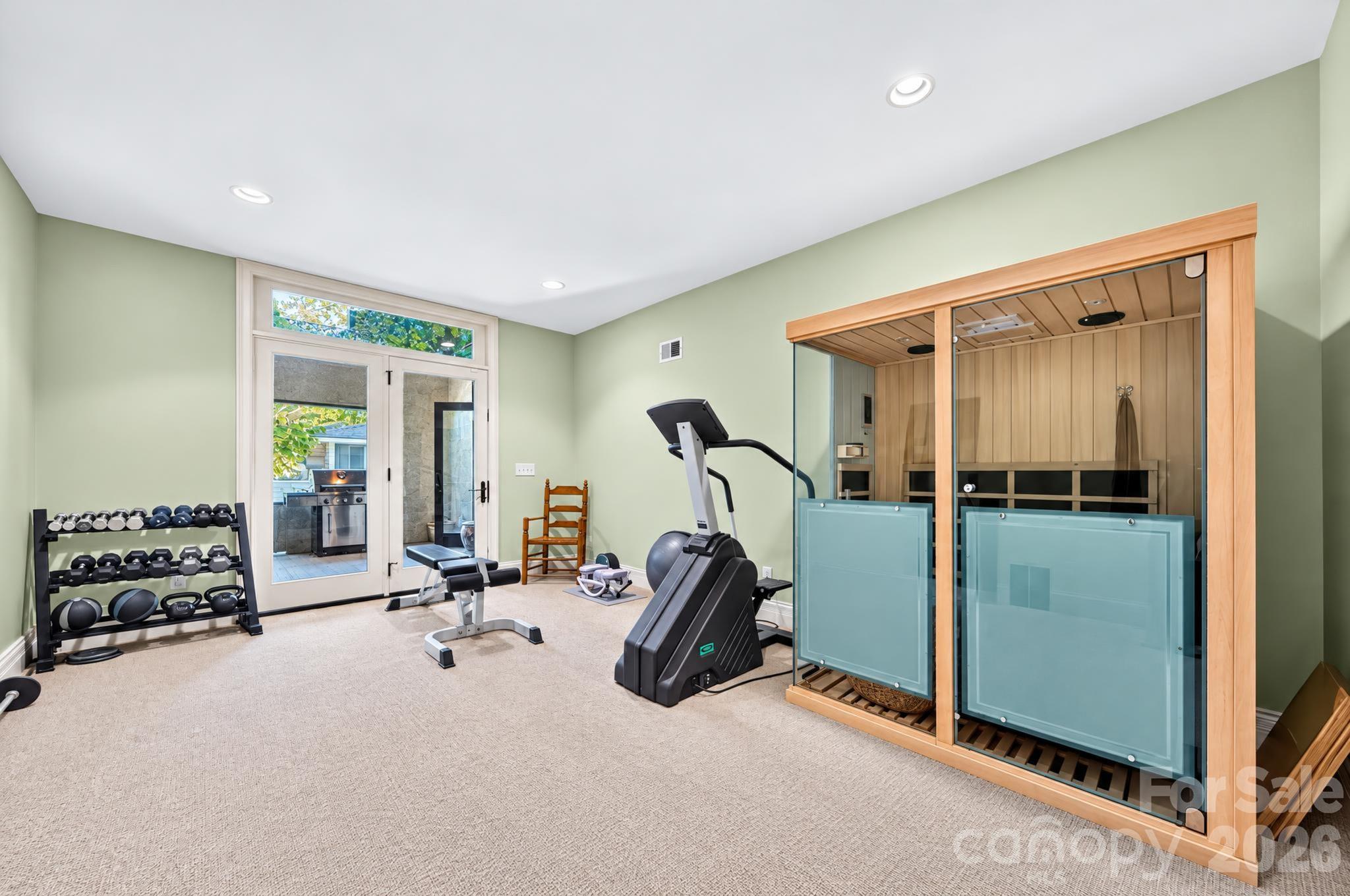 Exercise room with access to enclosed porch - 1340 Sardis Road N, Charlotte