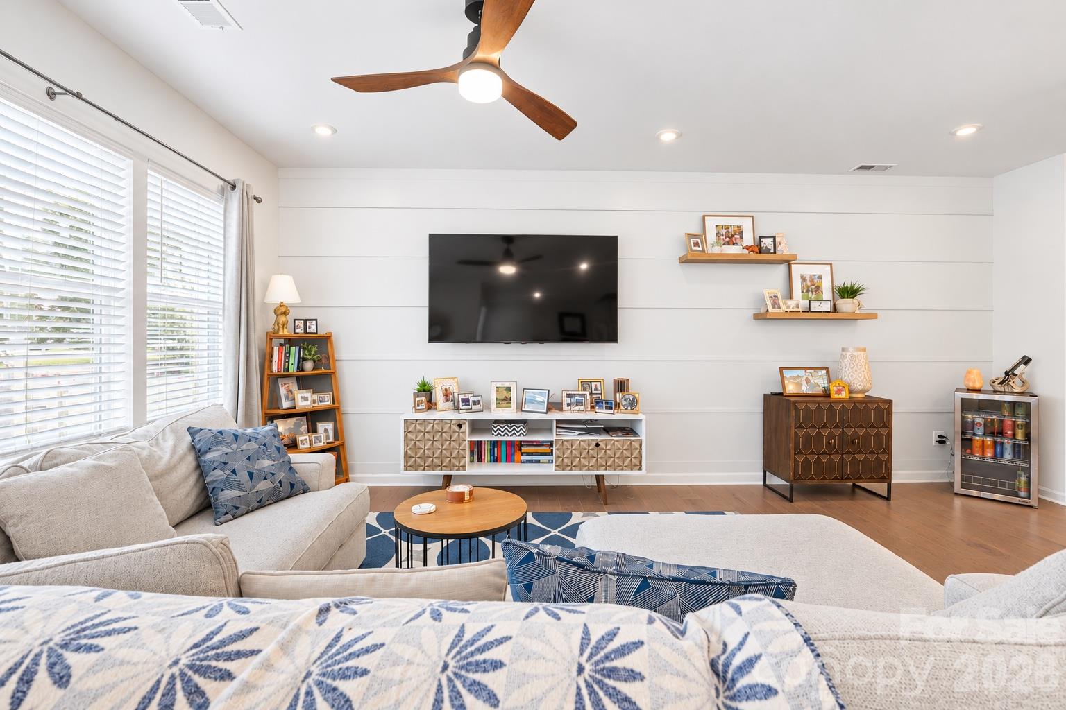 Family room with AI color change - 6161 Pierce Lane, Kannapolis