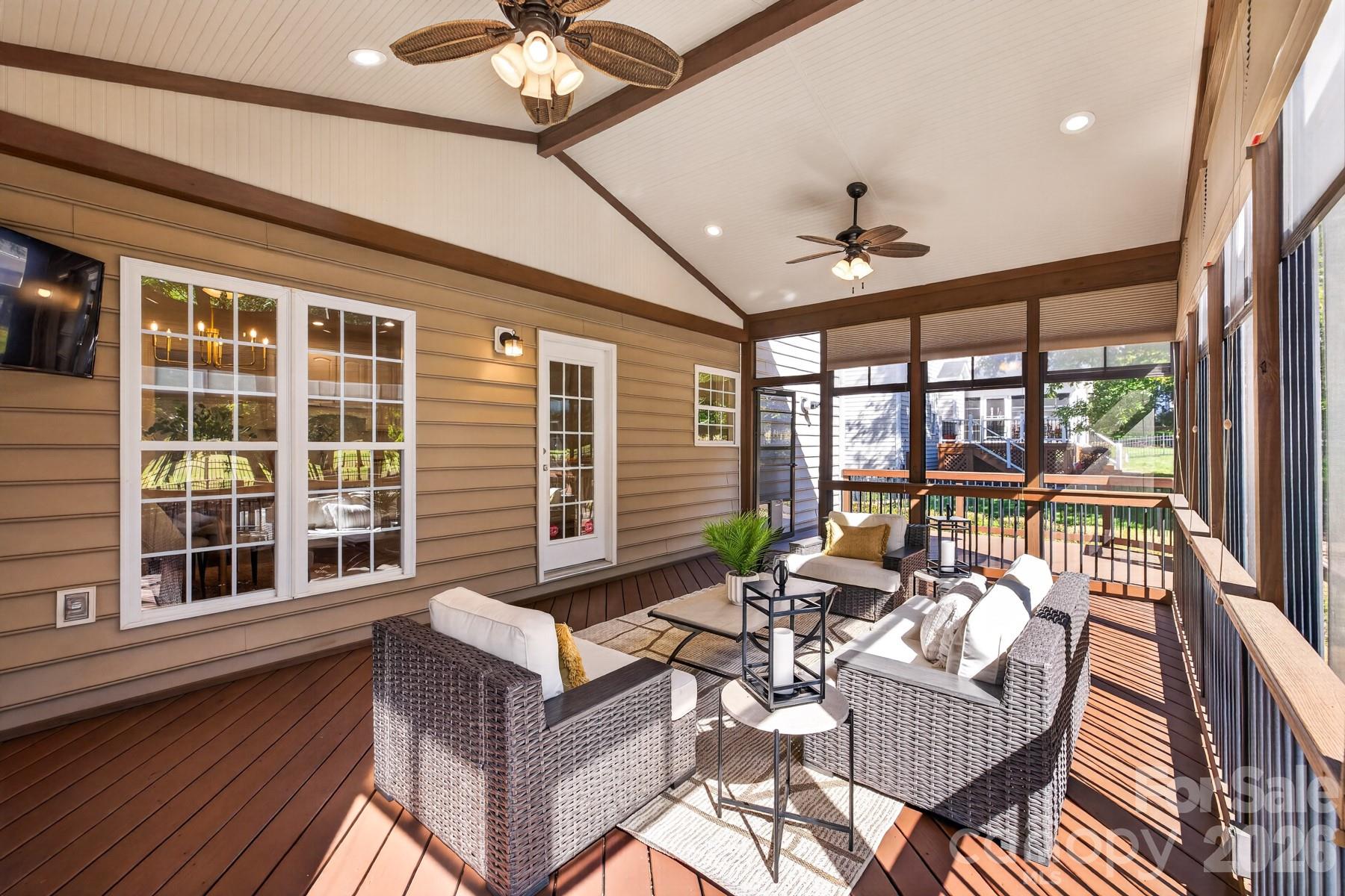 Back patio w roll down vinyl windows and screens - 10826 Persimmon Creek Drive, Mint Hill