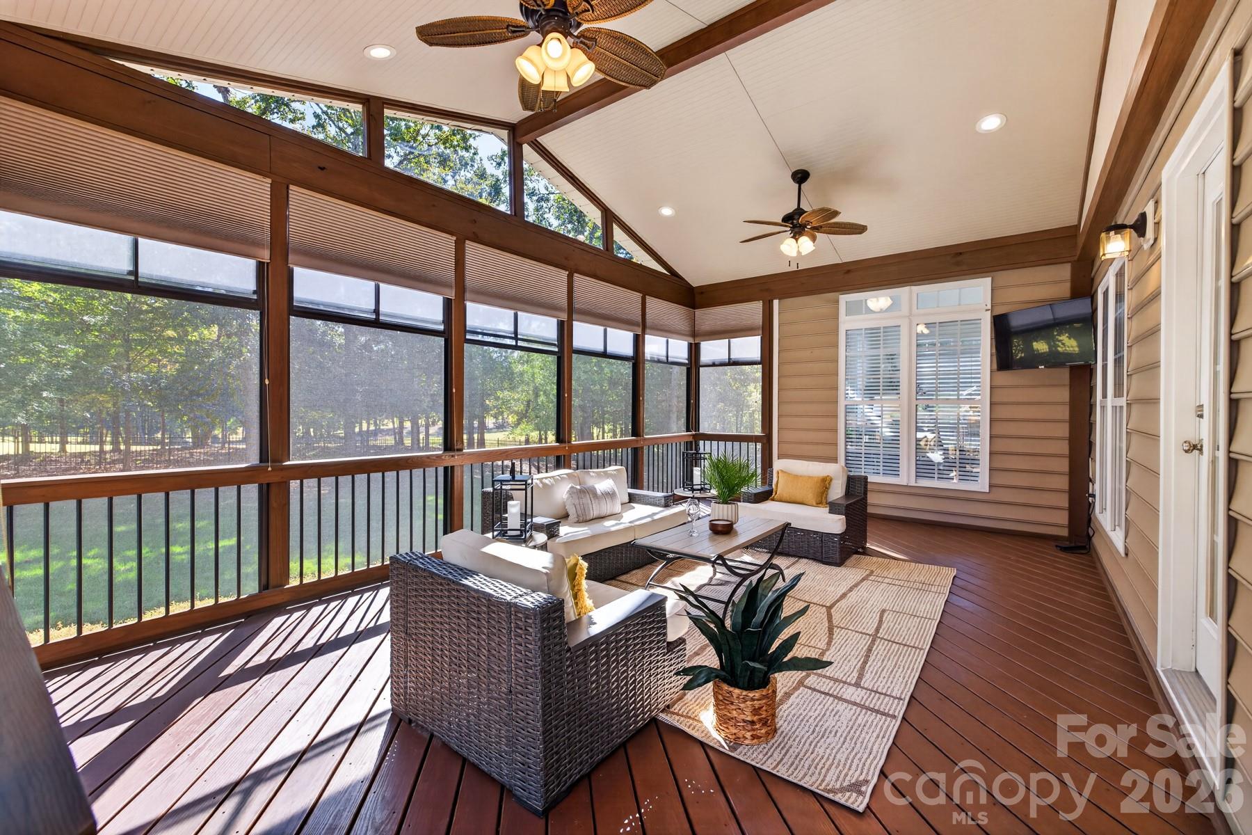 Back patio w roll down vinyl windows and screens - 10826 Persimmon Creek Drive, Mint Hill