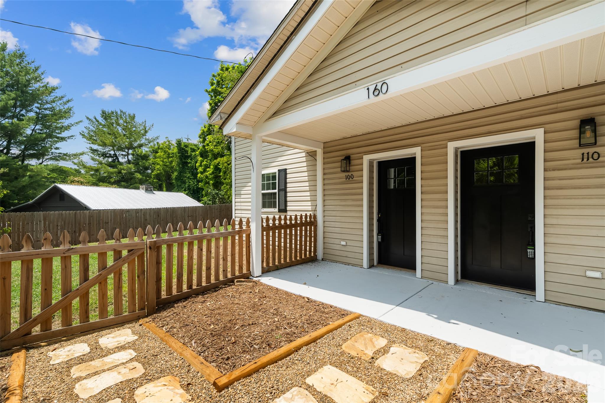 Looking to the left of the front doors towards the fenced in yard and State Street. - 160 State Street, Asheville