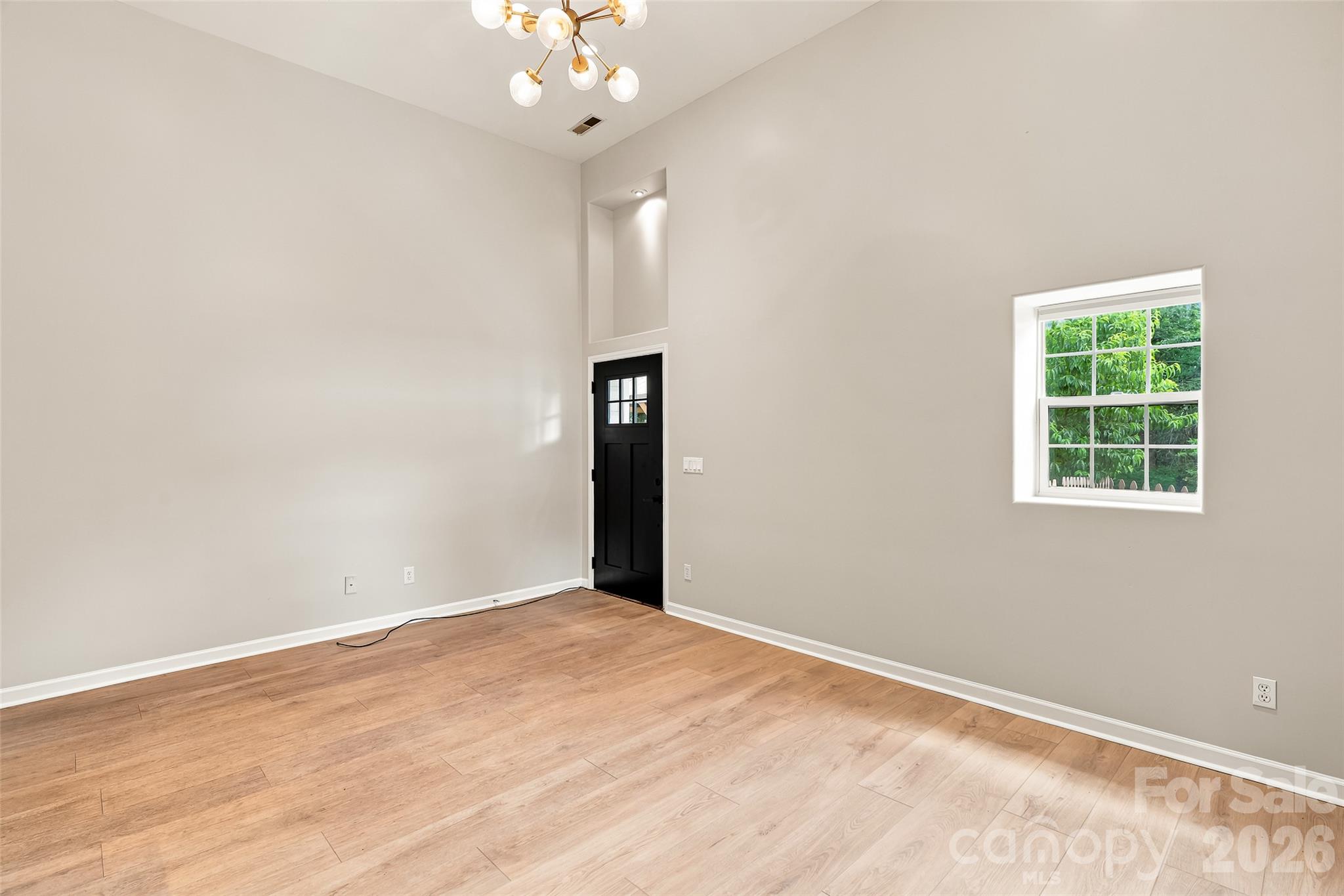 Left Side - living room looking towards the front door. - 160 State Street, Asheville