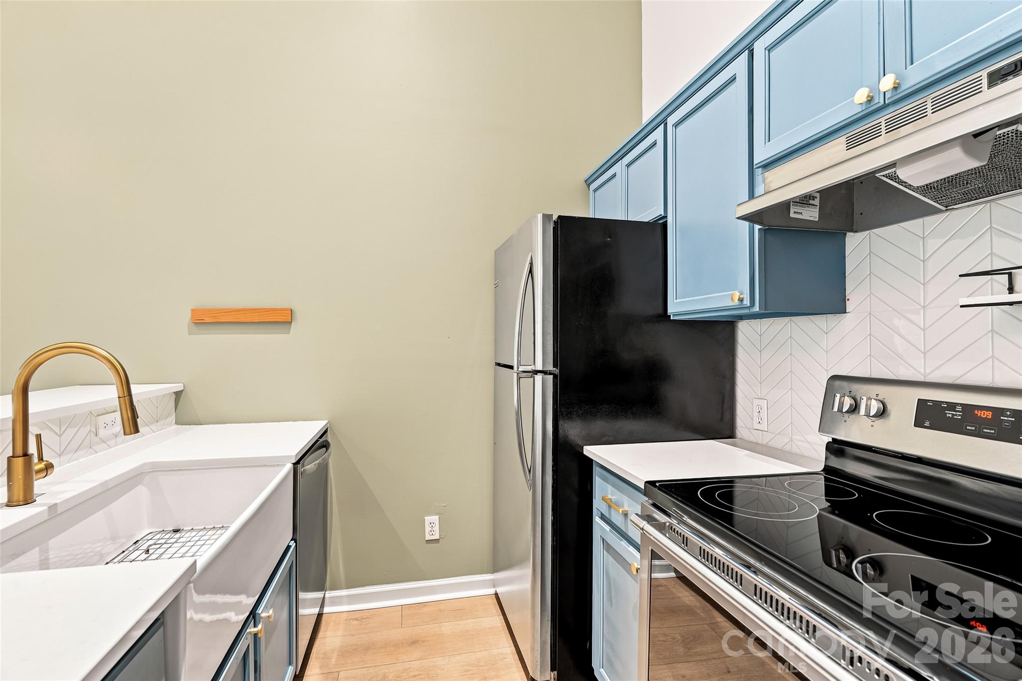 Left Side - kitchen with upgraded sink, counters and backsplash. - 160 State Street, Asheville